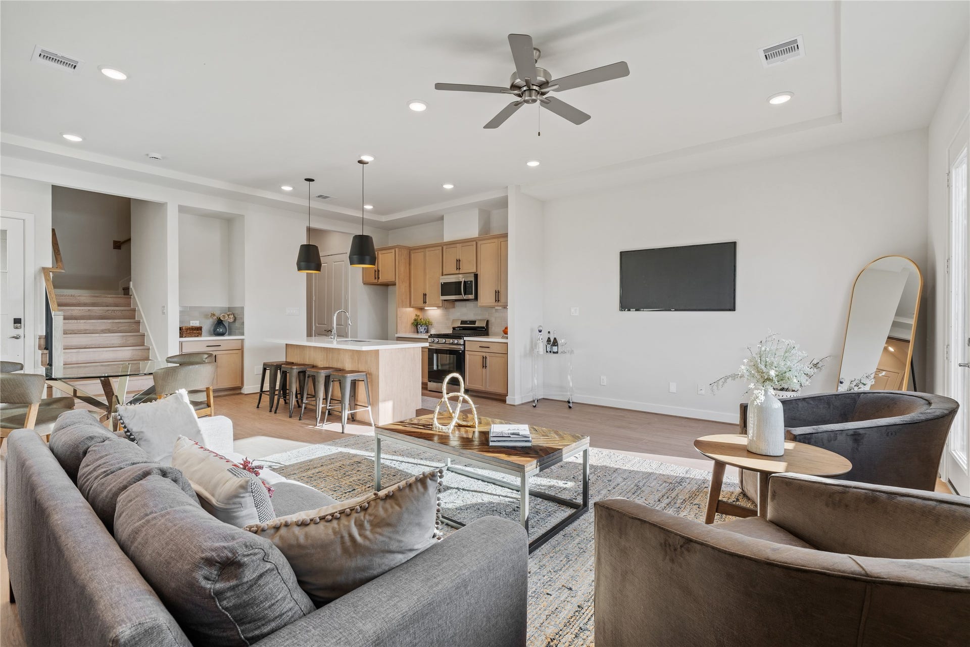 6441 Rena Street, Houston, TX 77092 The living area sits open to the kitchen with no walls interrupting the view, so the whole floor feels larger than the square footage suggests.