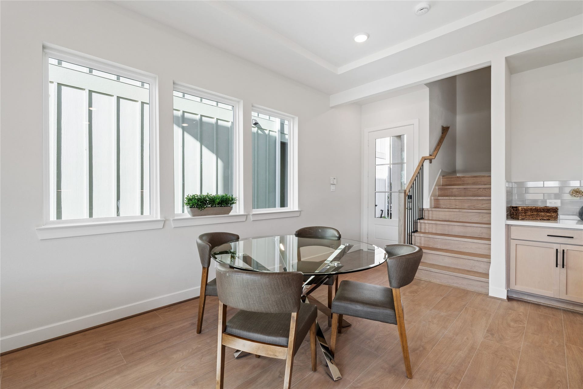 6441 Rena Street, Houston, TX 77092 A row of multi-pane windows along the dining area brings in steady natural light and keeps the space feeling open through the day.
