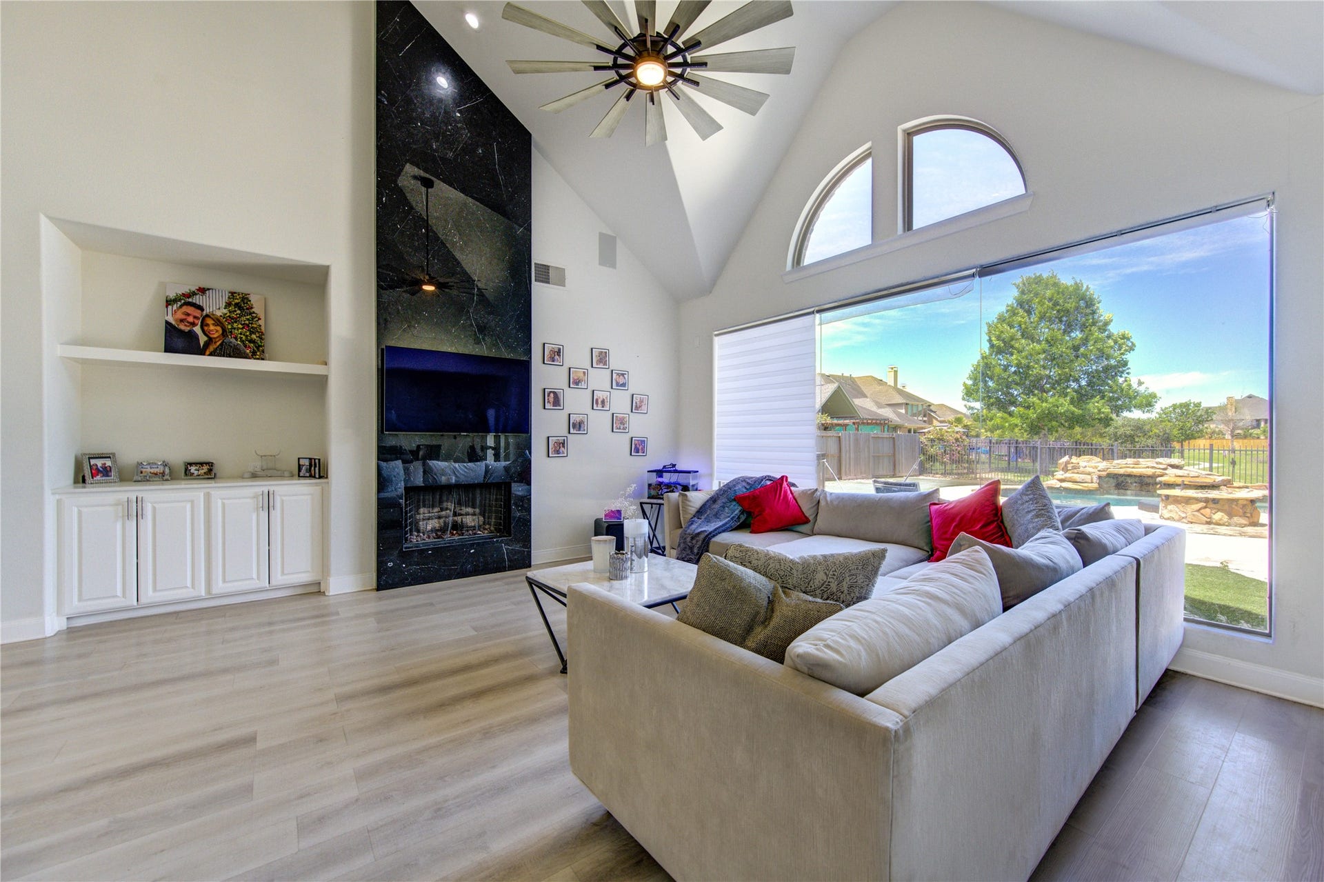 Open floor plan with high ceiling and Outstanding view of the lake and pool