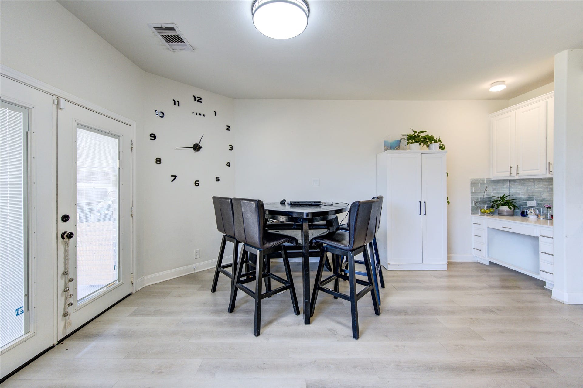 Bright breakfast nook with serene water viewsperfect for everyday dining