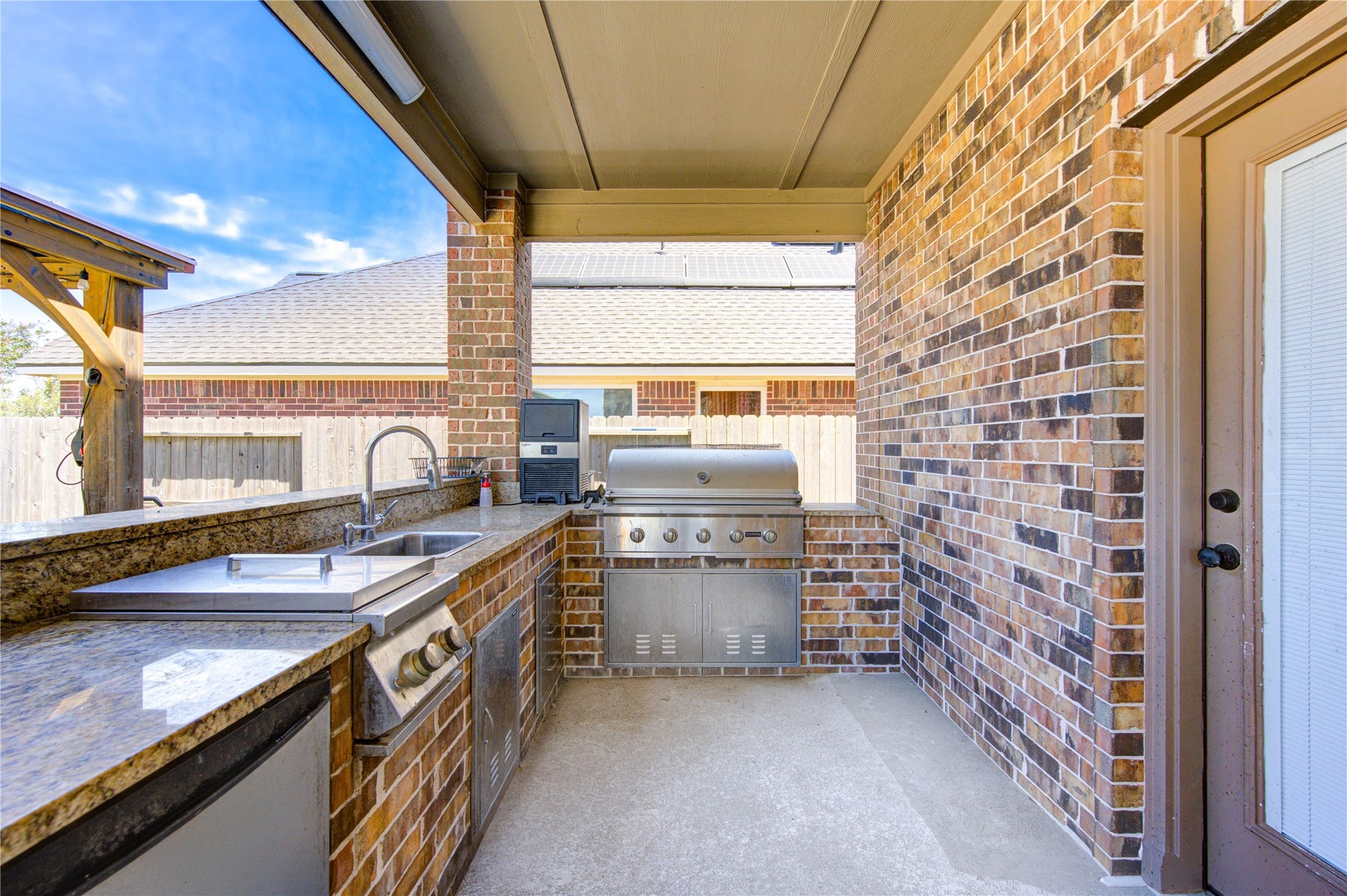 outdoor kitchen and a new full pool bathroom