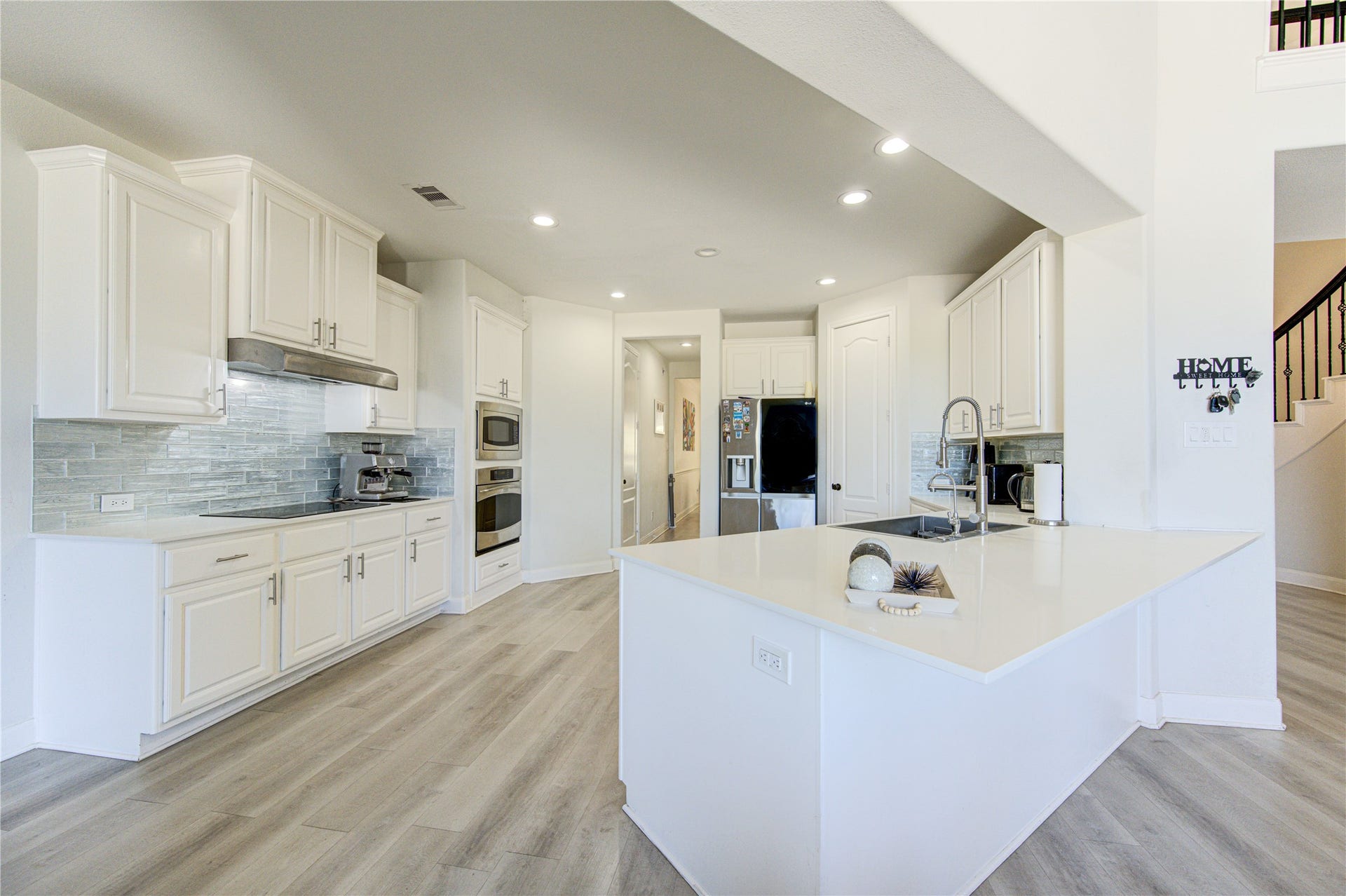 Chefs island kitchen featuring ample cabinetry, generous counter space, and seamless flow for entertaining.
