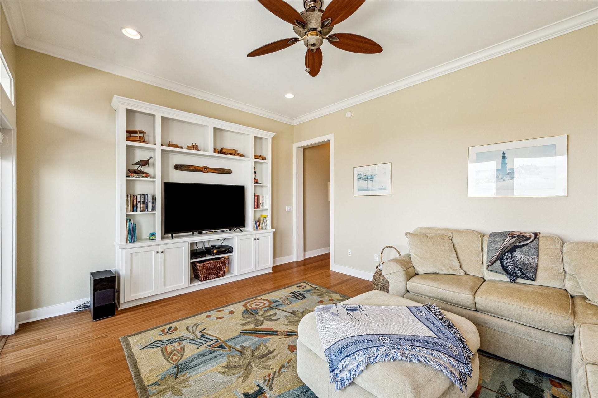 1 Shell Key, Hitchcock, TX 77563 A secondary view of the flex space showcases the custom built-ins that anchor the room with both style and function