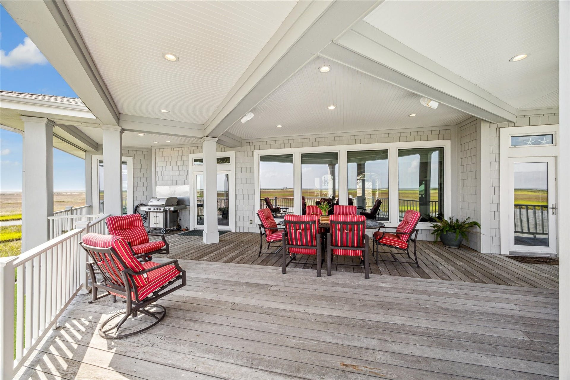 1 Shell Key, Hitchcock, TX 77563 Just off the main living area, step into an expansive covered patio deck designed for true coastal living. This generous outdoor space easily accommodates all your favorite furnishingsperfect for lounging, dining, and entertaining in comfort