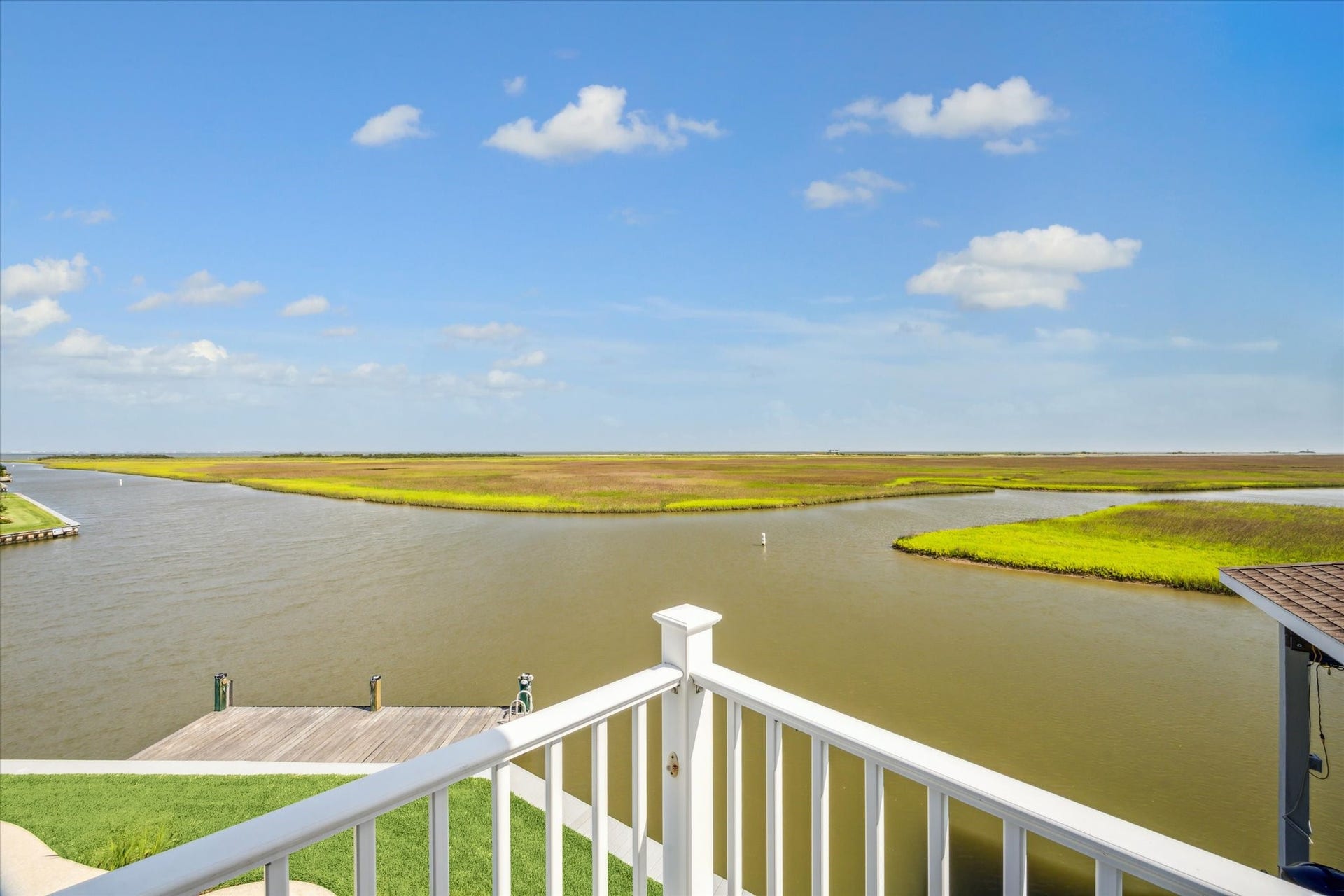 1 Shell Key, Hitchcock, TX 77563 This elevated vantage point offers a front-row seat to natures beauty, with panoramic vistas that stretch across West Galveston Bay and beyondperfect for soaking in vibrant sunsets and serene waterfront living