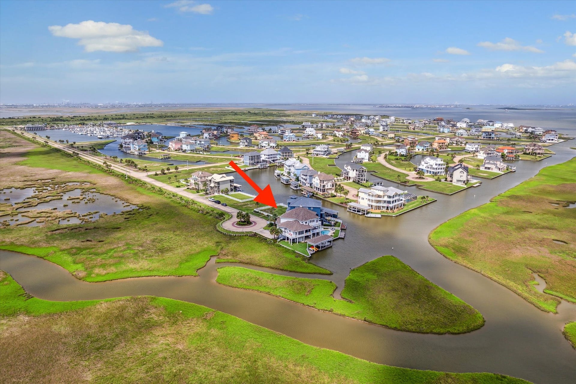 1 Shell Key, Hitchcock, TX 77563 One-of-a-kind 270-degree view with permanent, unobstructed vistas of West Galveston Bay, the Intracoastal Waterway, and coastal wetlands from every room in the home. Enjoy endless sunrise & sunset views from multiple balconies