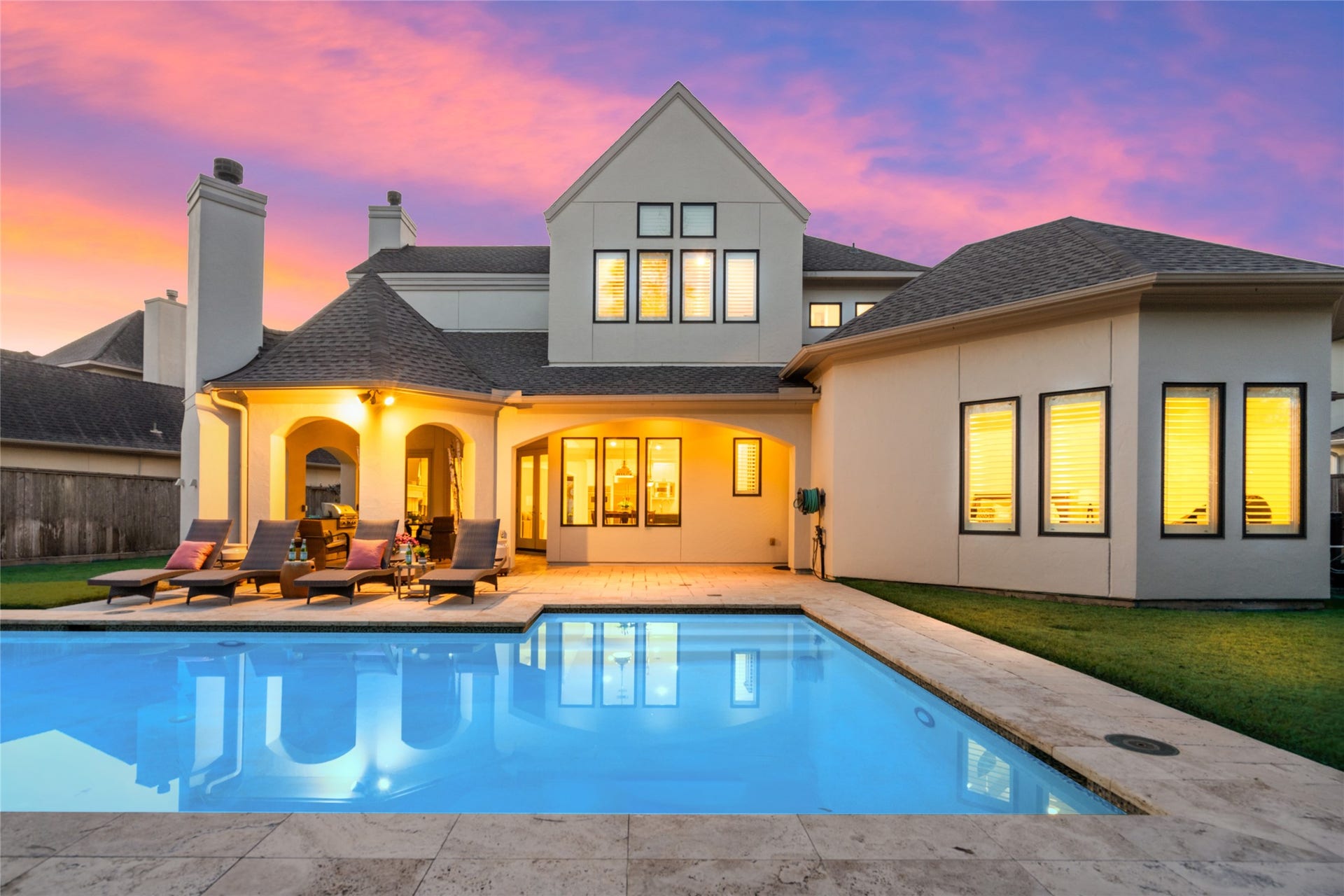 Enjoy this beautiful outdoor living space with covered patio, exterior doors into the family area as well as the primary bedroom.  Home has a MistAway mosquito mister so you can fully enjoy your summer evenings