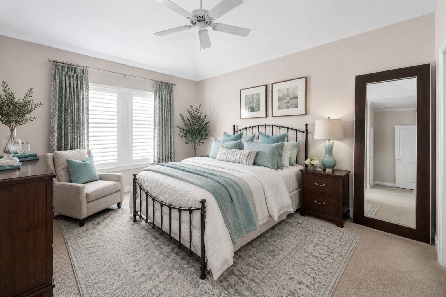Secondary bedroom on the second floor with walk-in closet and en suite bathroom.