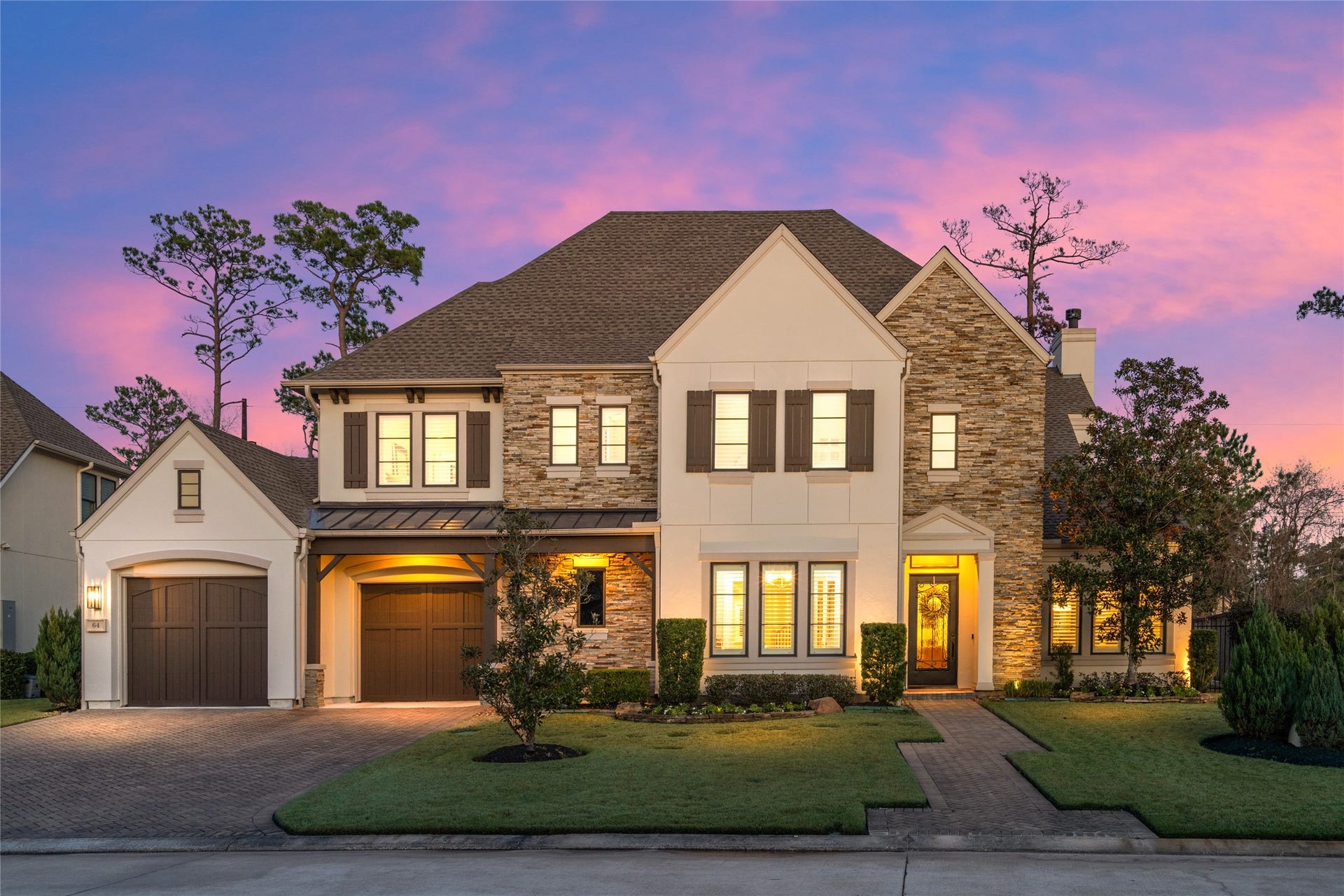 This home exudes curb appeal with it's stacked stone and stucco fascia, 2023- new roof, 3-car expoxy garage with EV Charger, beautifully manicured lawns, backing to green space.