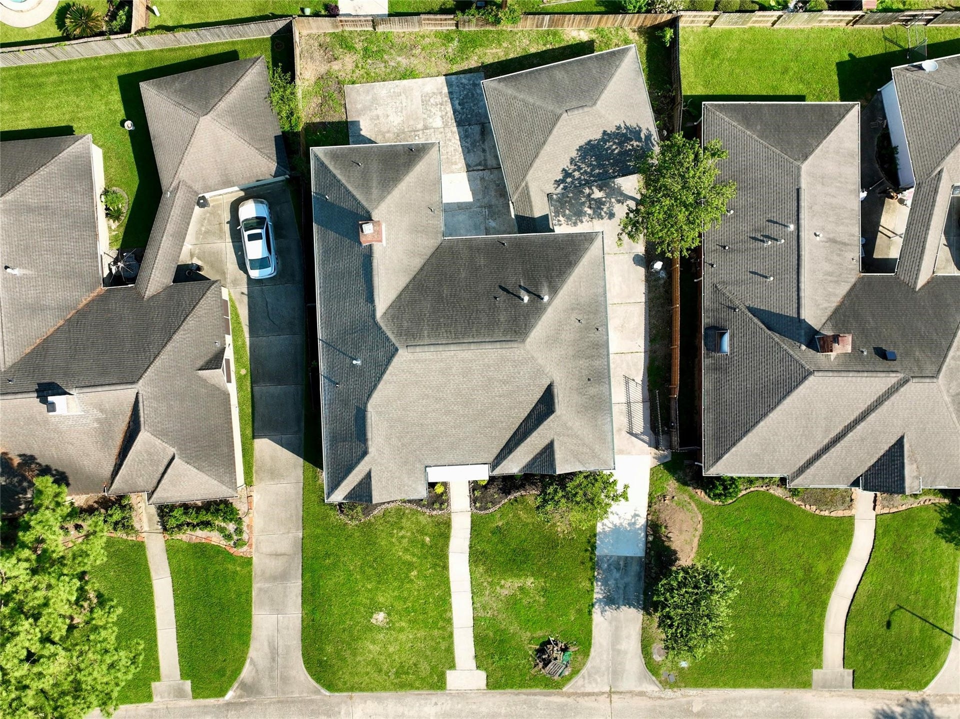 6003 Ancient Oaks Drive, Humble, TX 77346 Overhead aerial view offering a clear look at the propertys layout, front walkway, neighboring homes, and mature neighborhood surroundings.