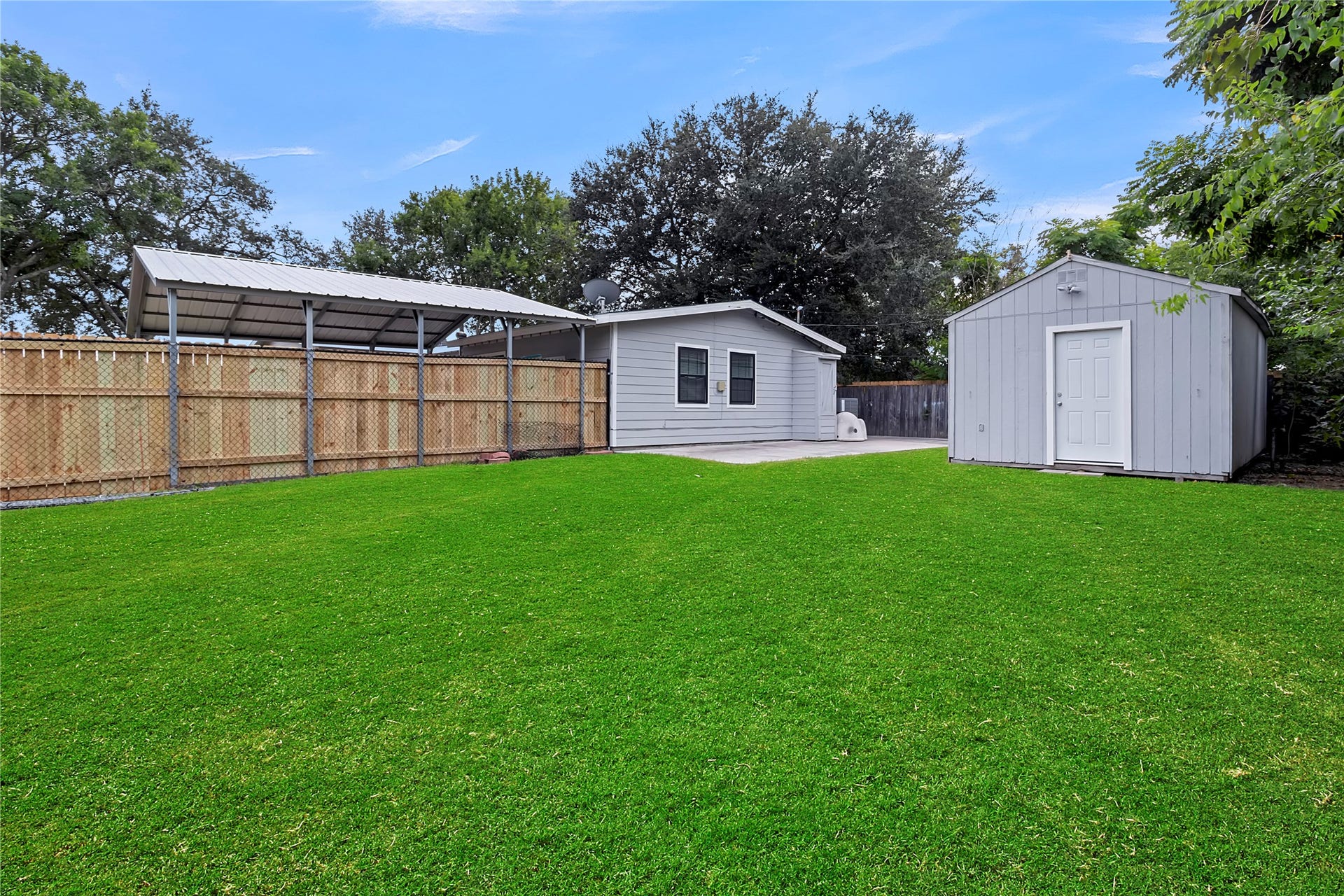 604 19th Avenue N, Texas City, TX 77590 Large backyard offers plenty of usable outdoor space, along with a detached storage shed/workshop equipped with electricity.