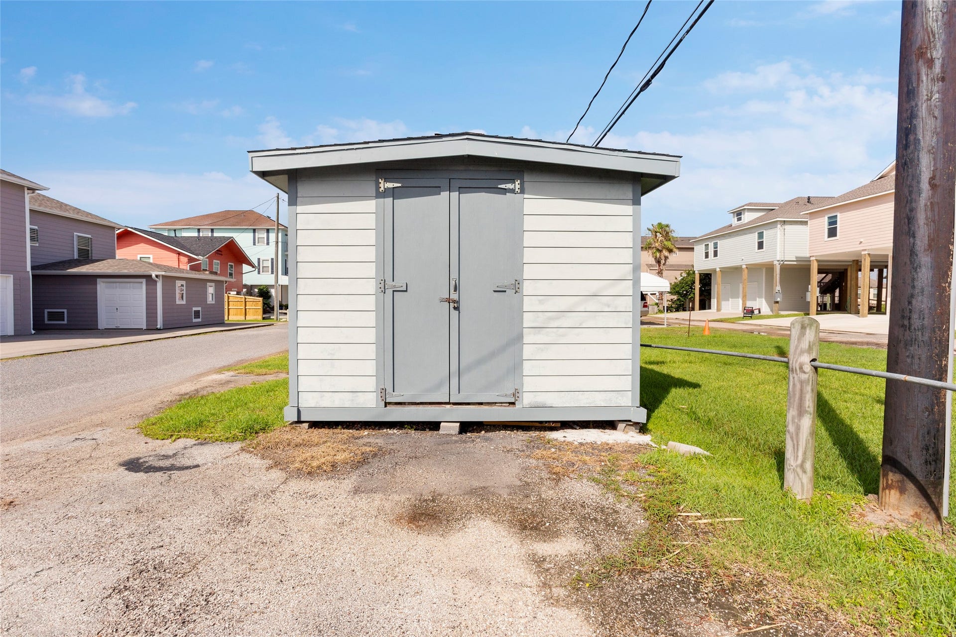 31 Lakeside Drive, Hitchcock, TX 77563 Convenient storage shed located just across the street.