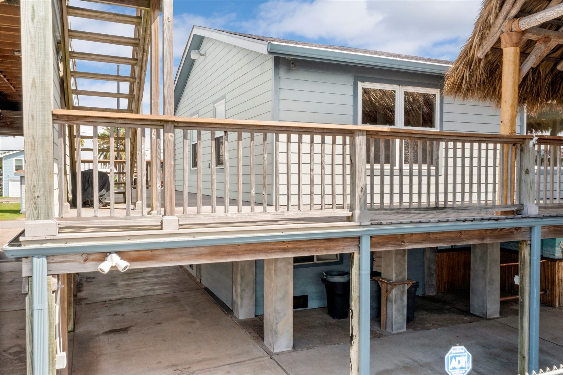 31 Lakeside Drive, Hitchcock, TX 77563 Enjoy breathtaking views from three levels of waterfront decks and patios.