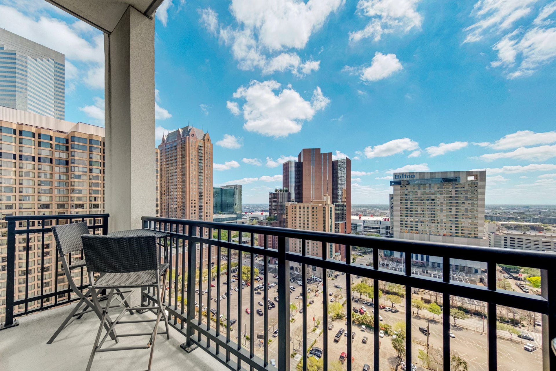 1211 Caroline Street, #1801, Houston, TX 77002 Spacious balcony with sweeping
city views and afternoon shade
ideal for relaxing outdoors.