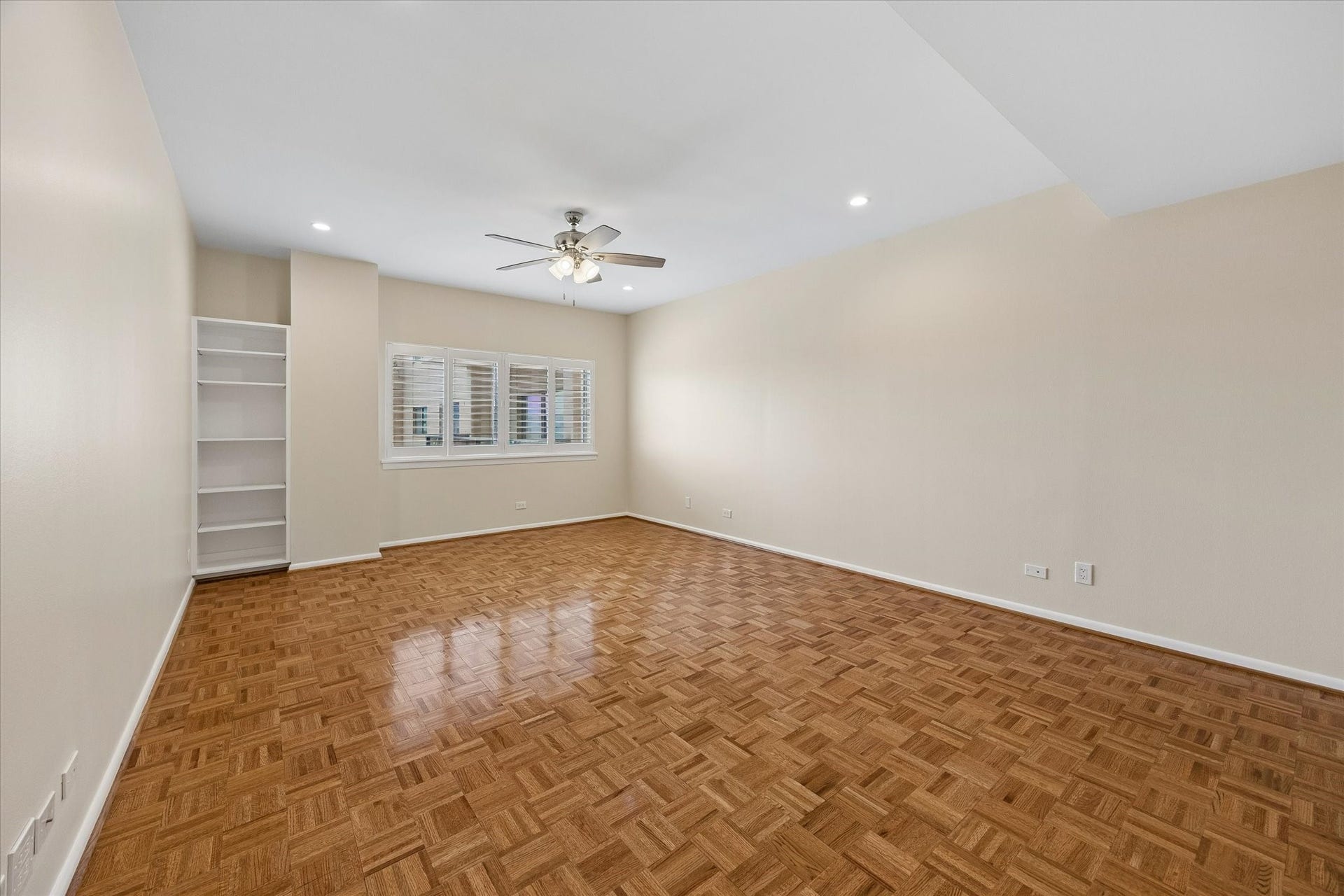 2929 Buffalo Speedway, #A303, Houston, TX 77098 Large Master Bedroom (15.5 x 21.1) with gorgeous parkay flooring and plantation shutters