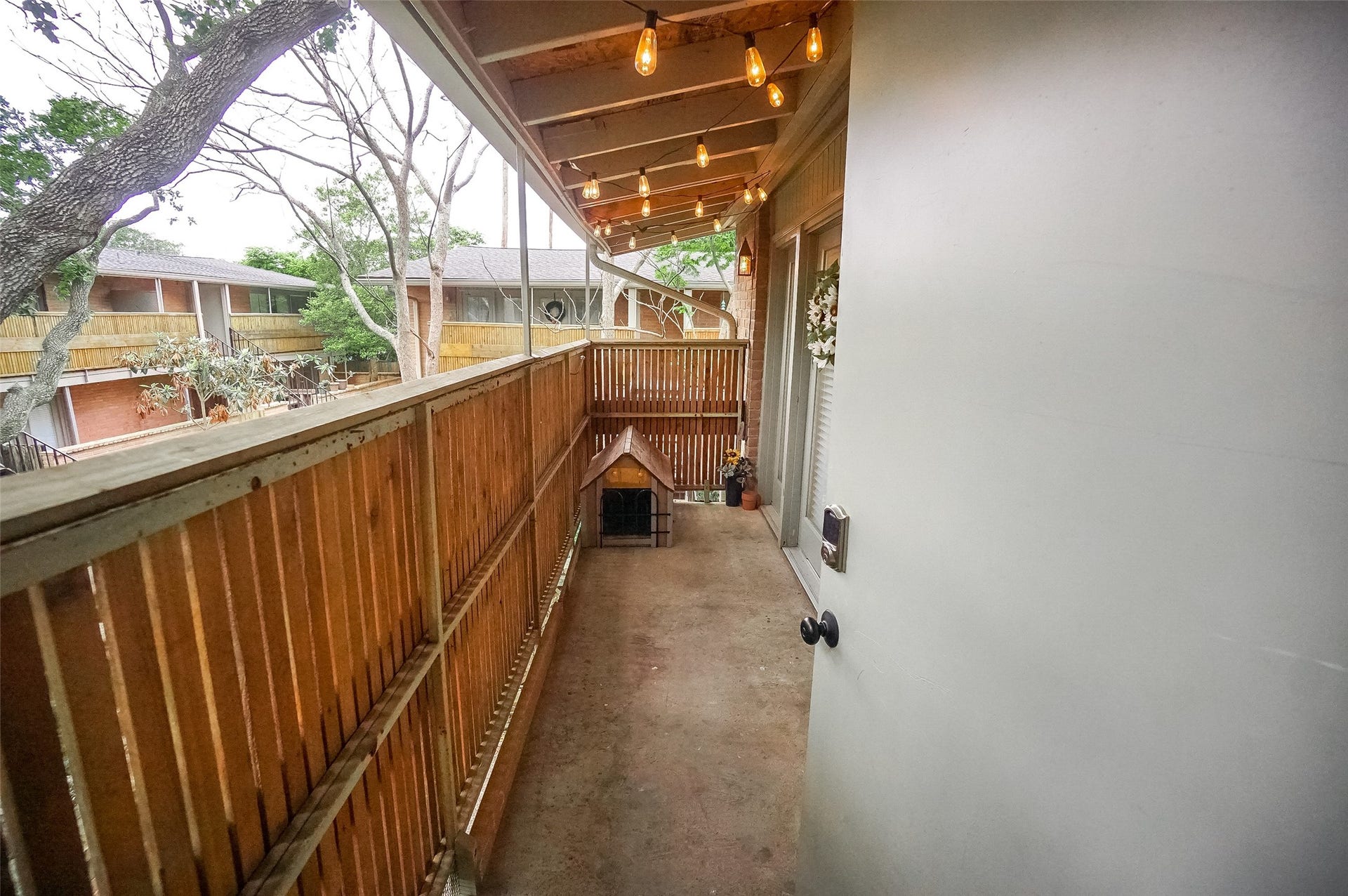 3942 W Alabama Street, #8, Houston, TX 77027 Another view of the front porch that shows the patio door with lock.
