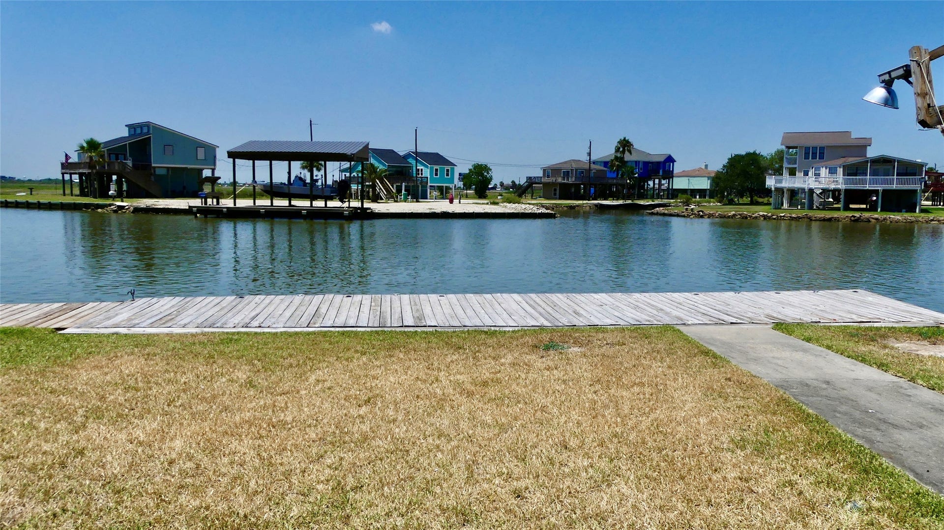58 Lakeside Drive, Hitchcock, TX 77563 Ground level view across water