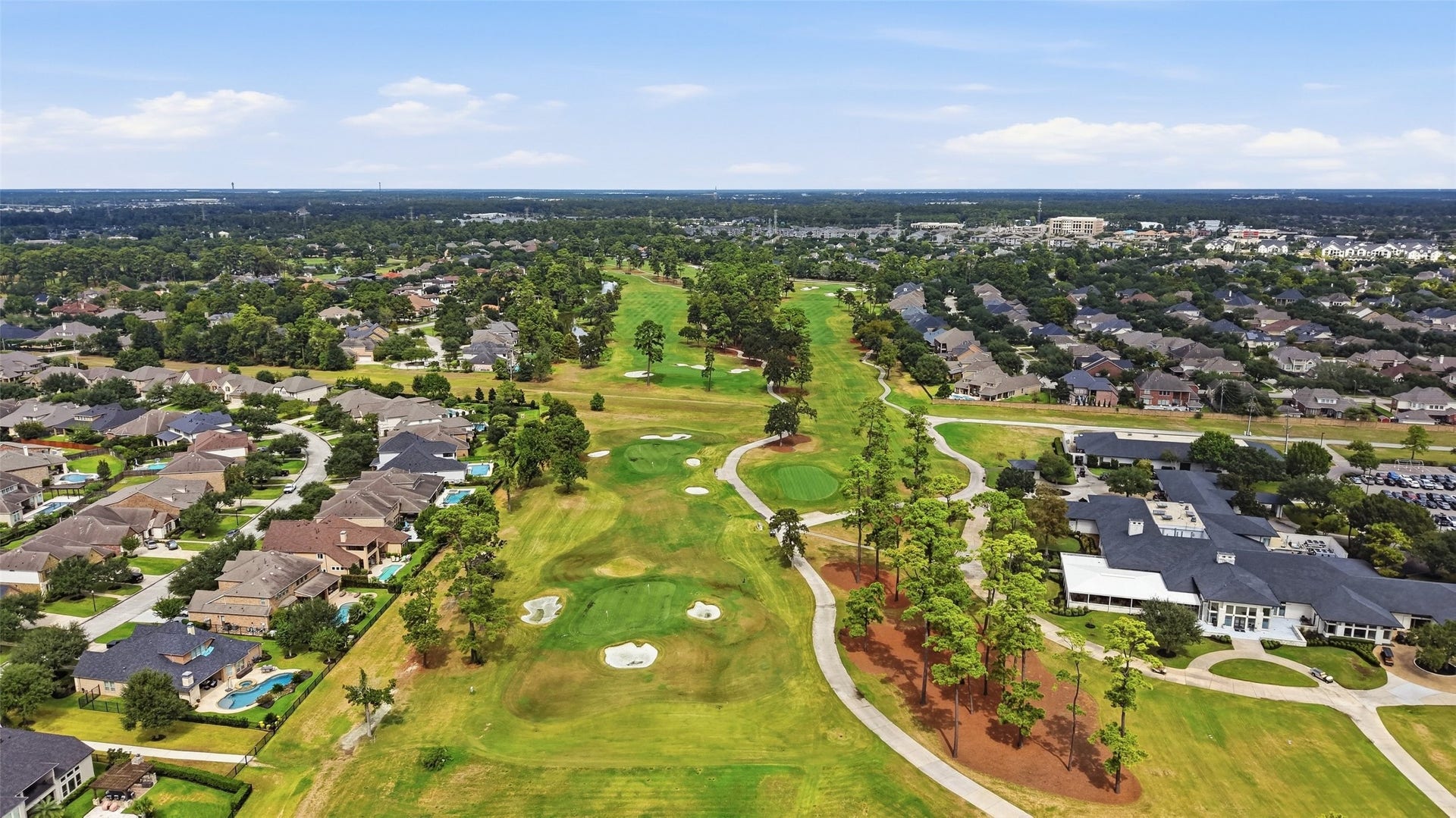 8311 Caroline Ridge Drive, Humble, TX 77396 Nestled alongside a beautifully manicured golf course, this neighborhood offers lush green views and a serene atmosphere, perfect for golf enthusiasts and those seeking a peaceful community setting.