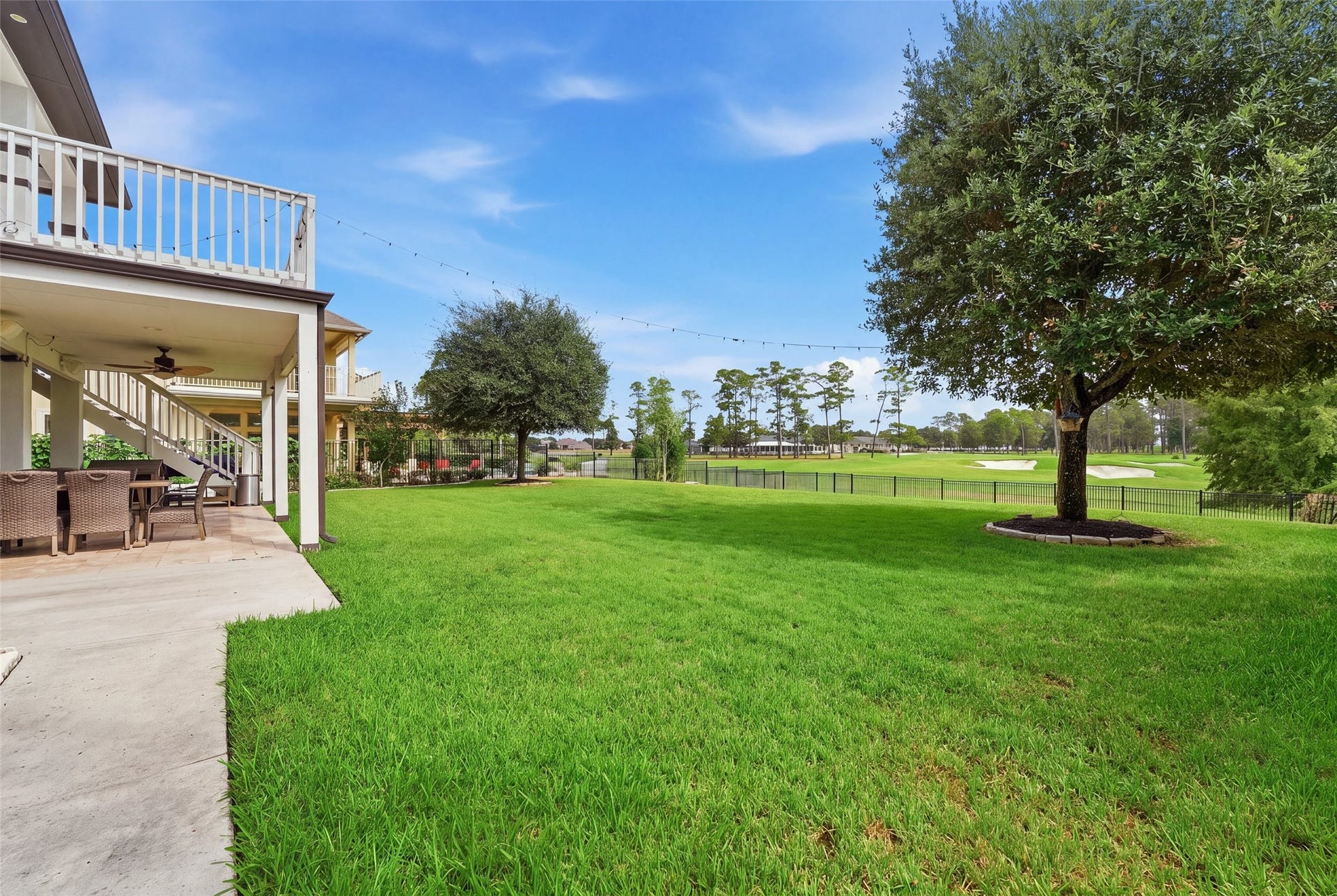 8311 Caroline Ridge Drive, Humble, TX 77396 Extended patio and walkway to front edge of home