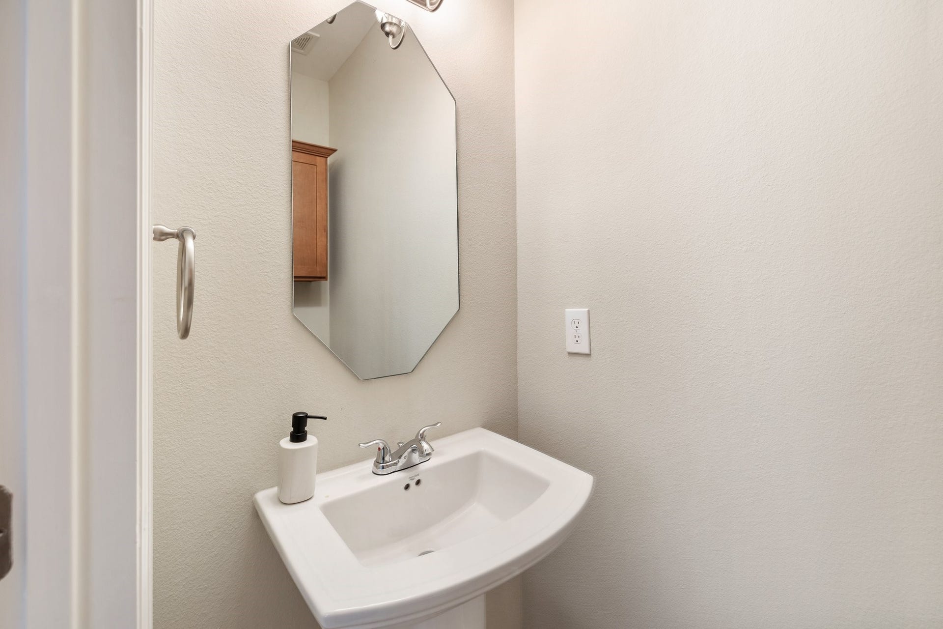 4206 Darter Street, Houston, TX 77009 A half bathroom is conveniently located on the first floor.