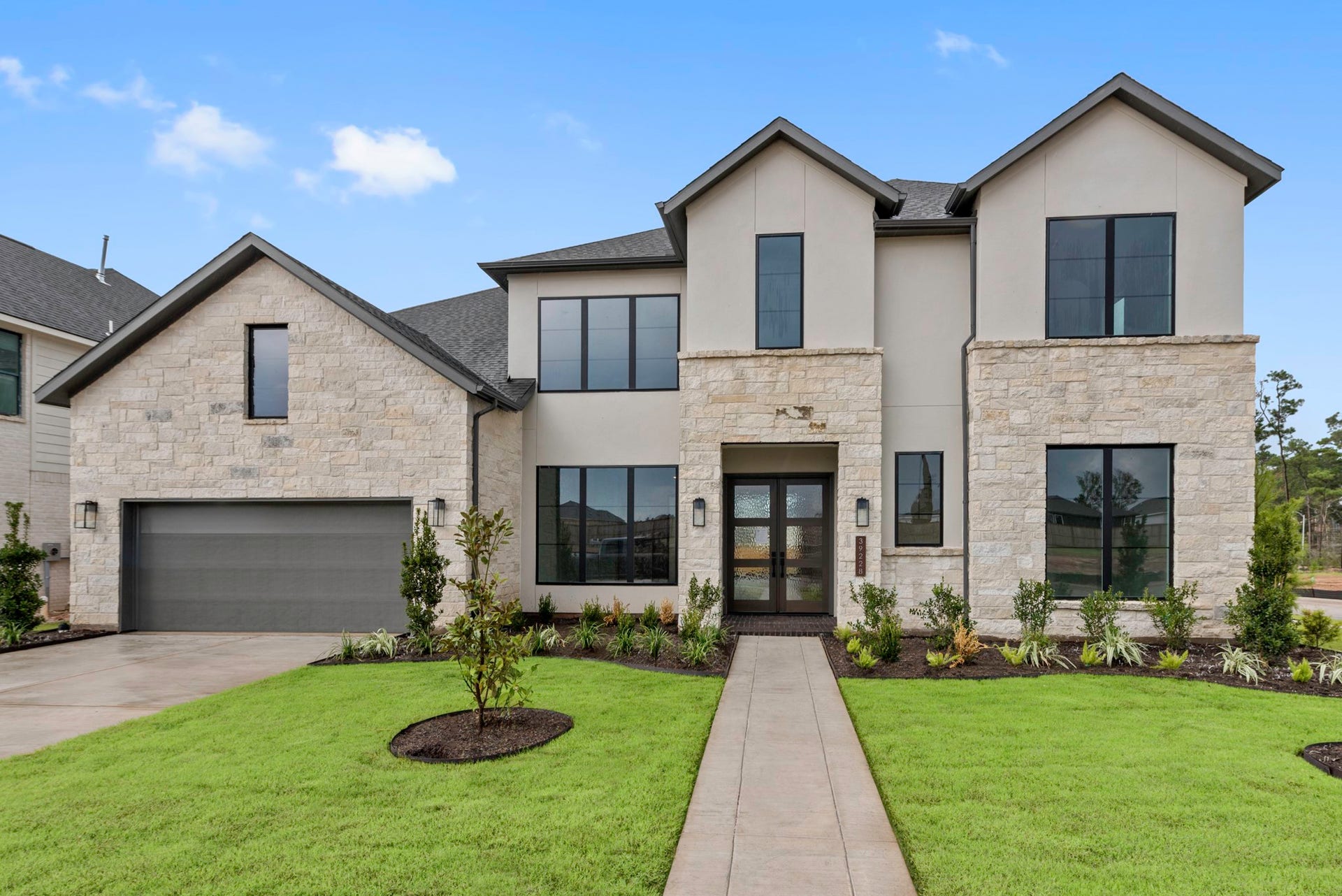39228 Water Rail Court, Magnolia, TX 77354 Move in Ready. Westin Homes *New Construction* Gray III Plan. Grass is digitally enhanced.