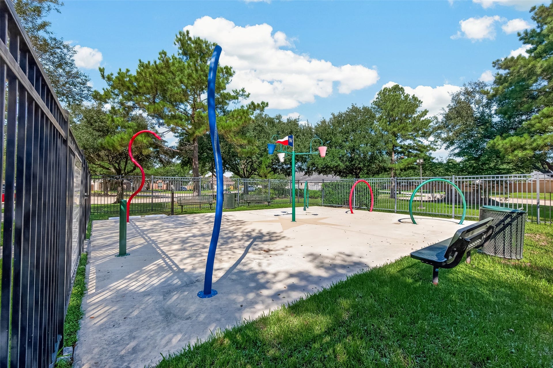 18019 Rexine Lane, Cypress, TX 77433 Enjoy outdoor fun at this vibrant community splash pad, surrounded by lush greenery and perfect for family gatherings.