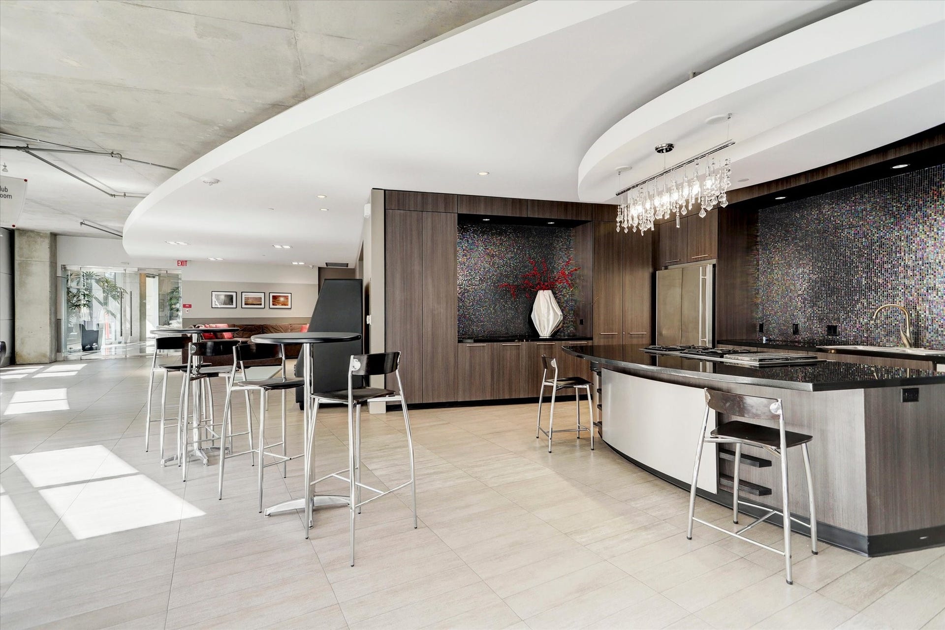 Common area kitchen you can reserve for your large parties that spill over from your private loft.  Full kitchen and lounge area is the perfect space to hold a special event.  Just simply book it with the office and it is yours!