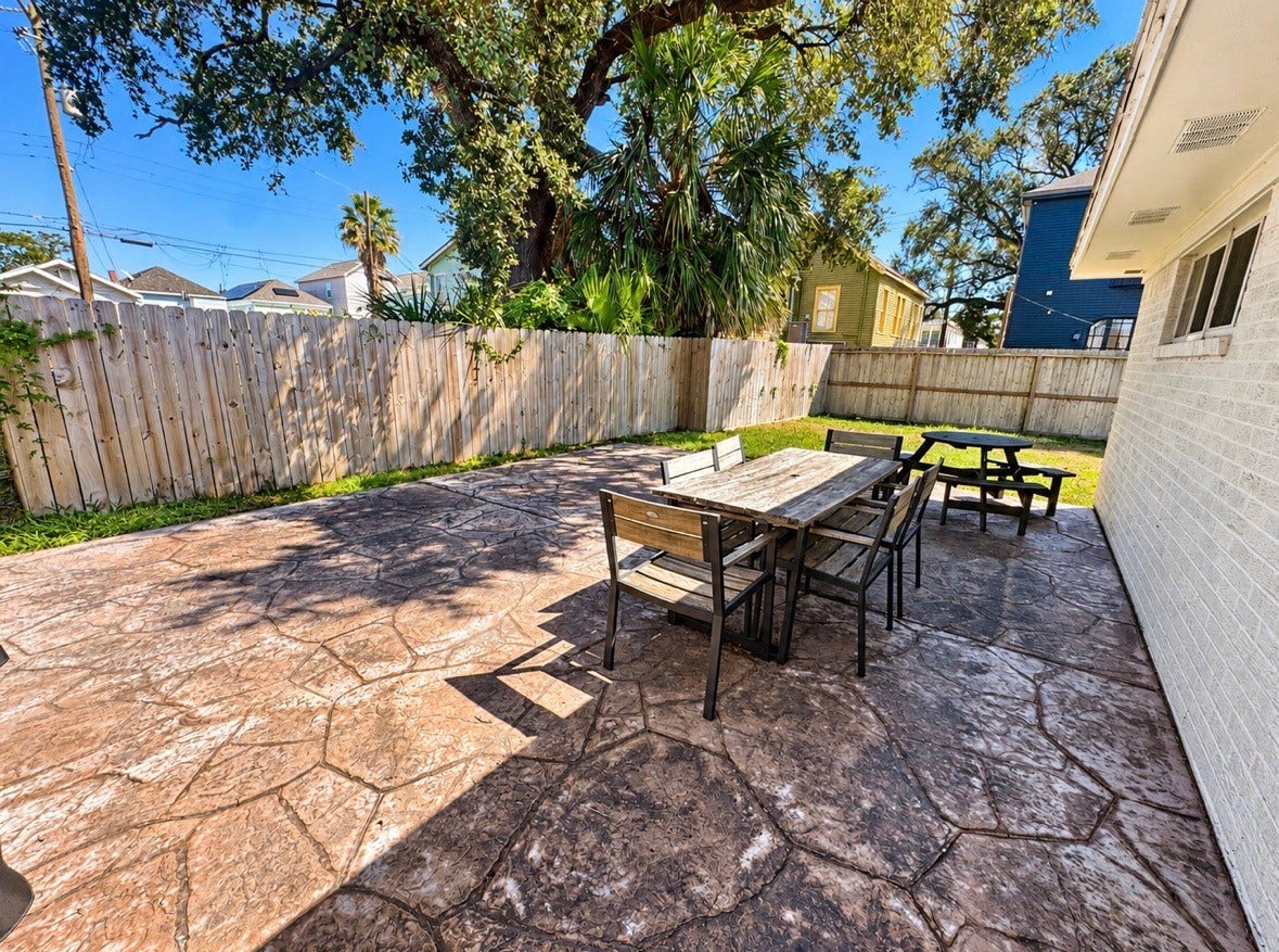 1112 32nd Street, Galveston, TX 77550 Another view of the spacious patio and side yard.