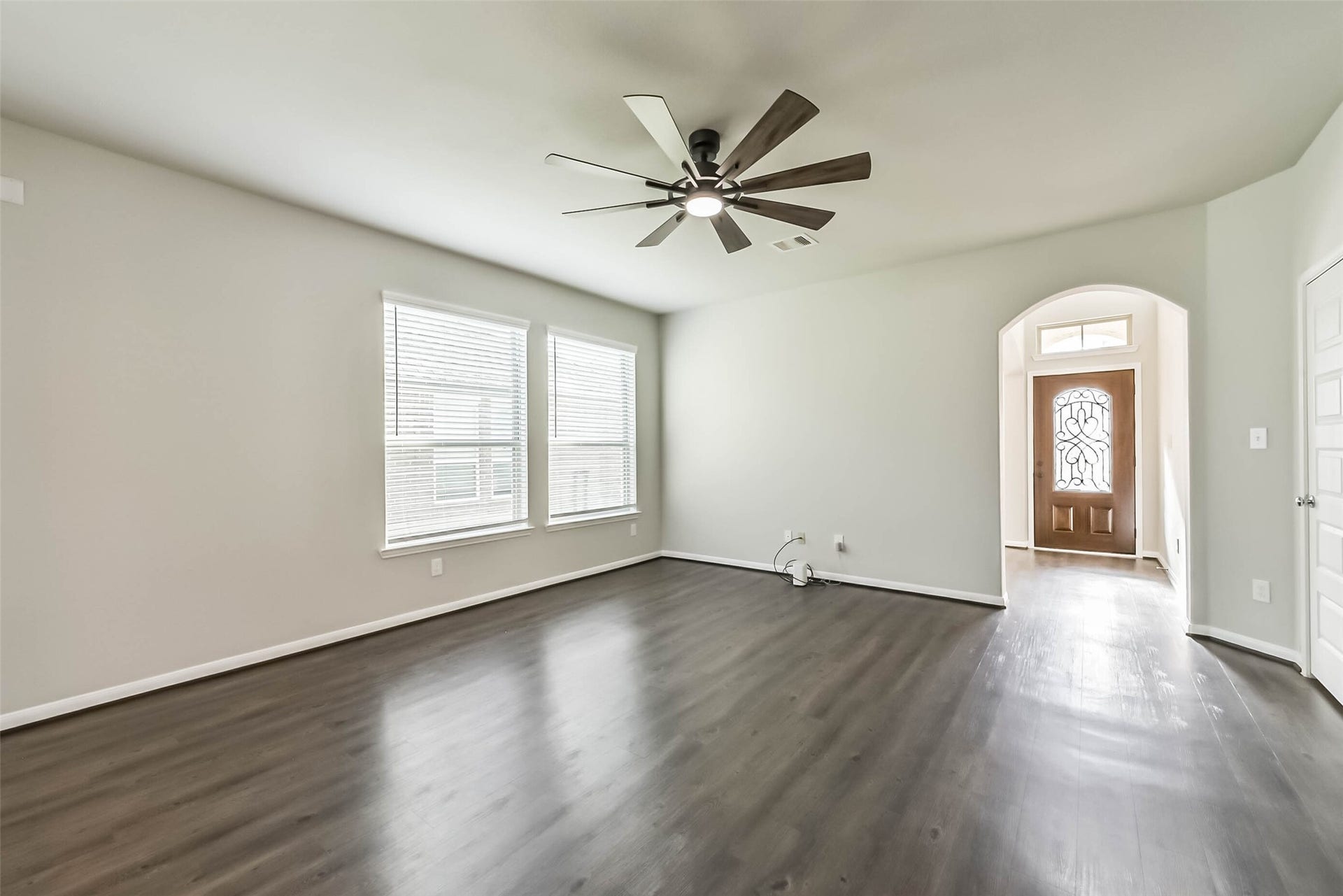 Bright family room with plenty of space to gather.