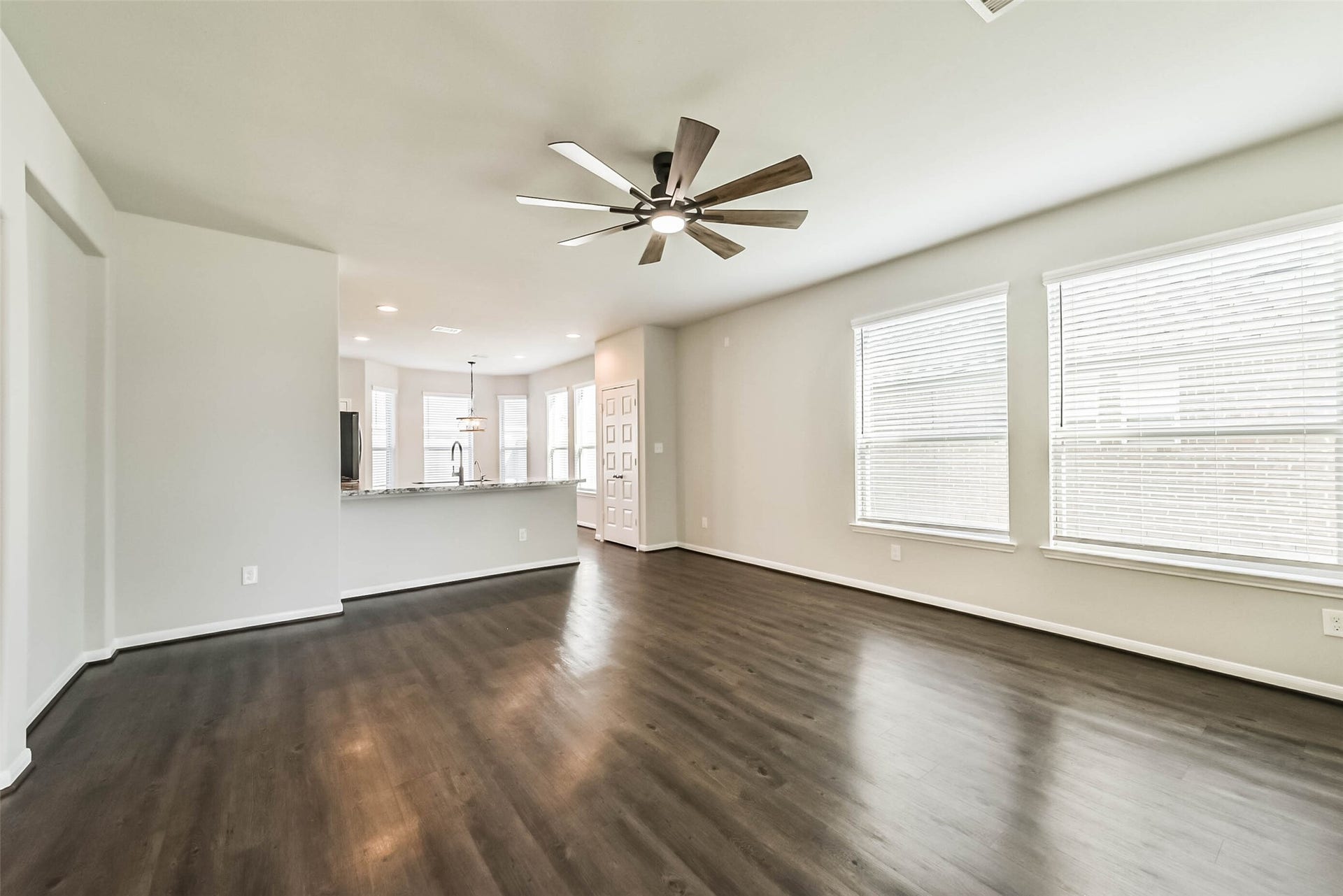 Spacious family room with abundant natural light.