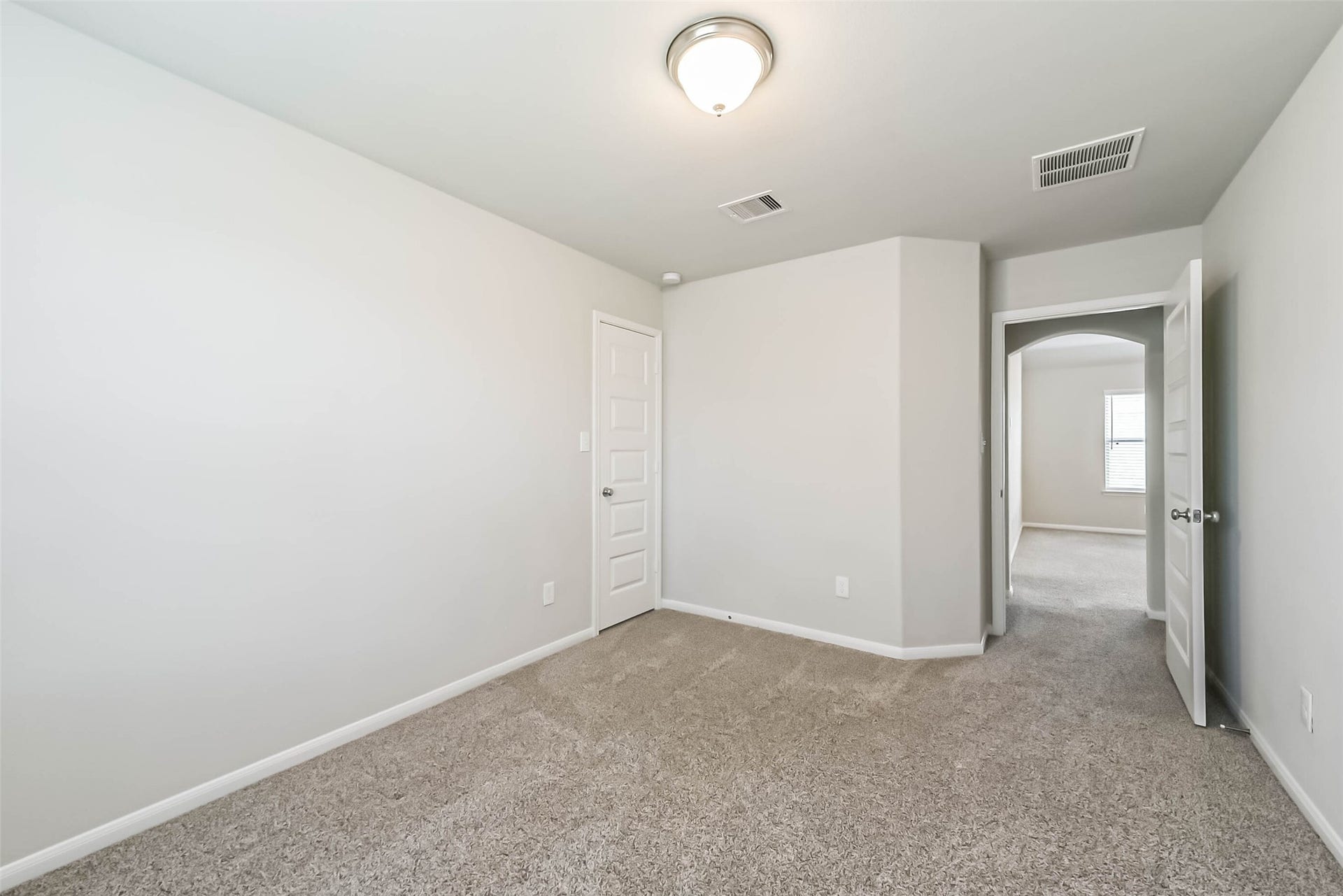 Additional bedroom offers flexible living space.