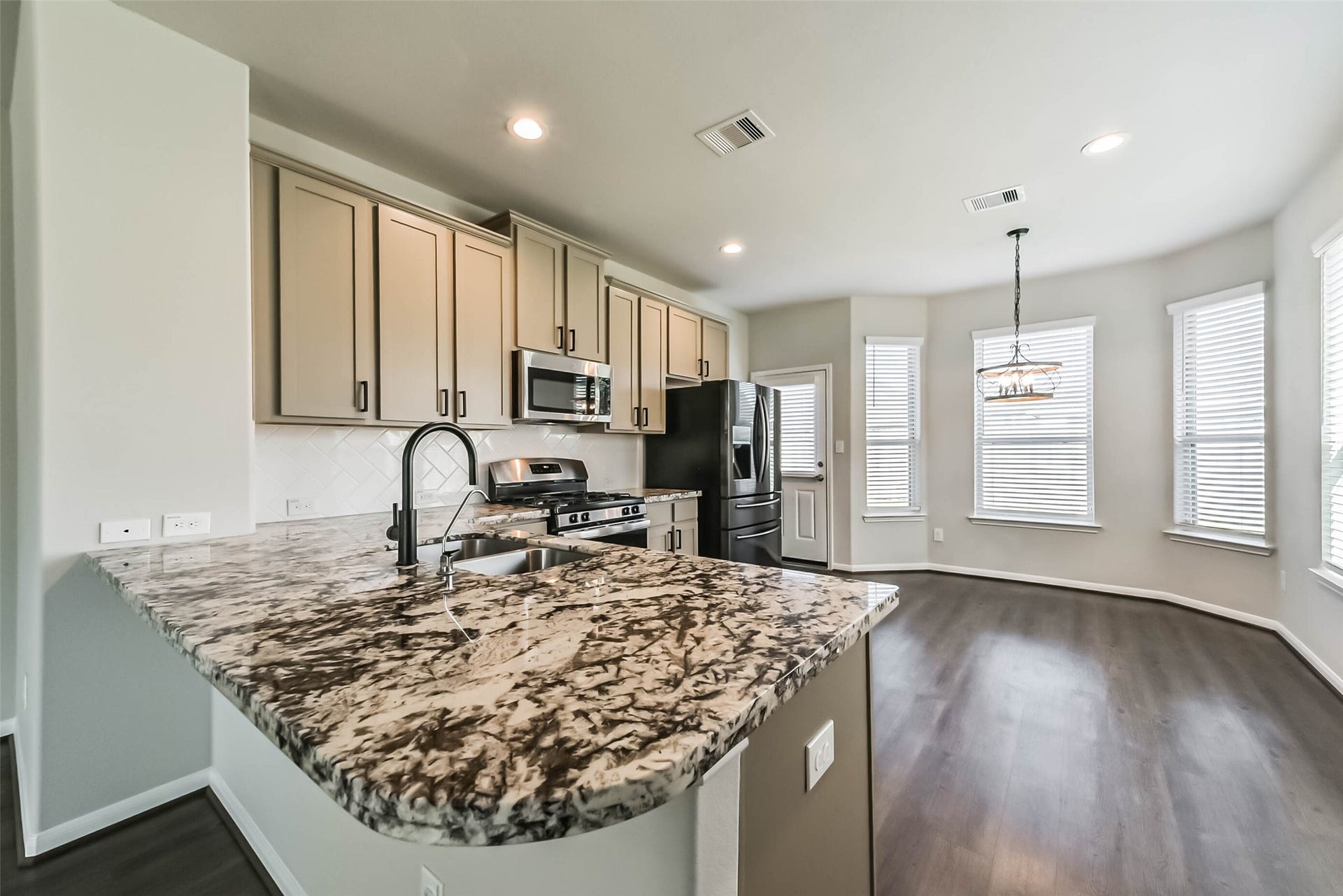 Granite countertops and upgraded kitchen features.