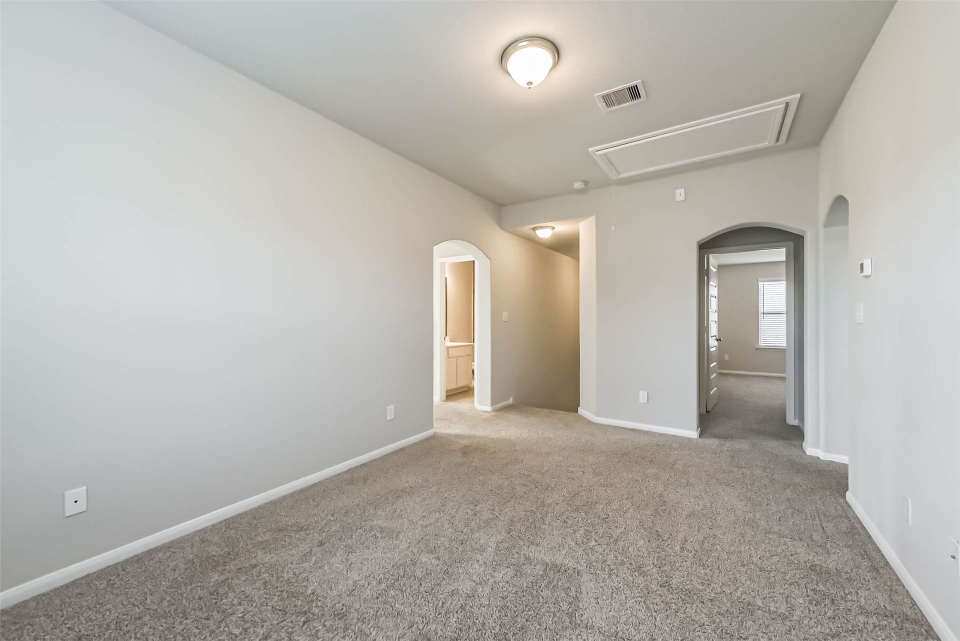Versatile upstairs game room with plenty of space.
