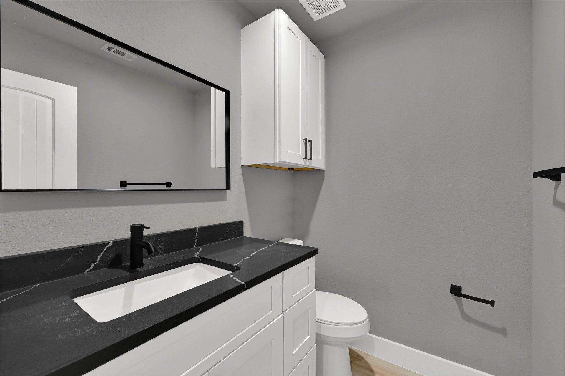7415 Hezekiah Ln, #B, Houston, TX 77088 half bathroom on the first floor.