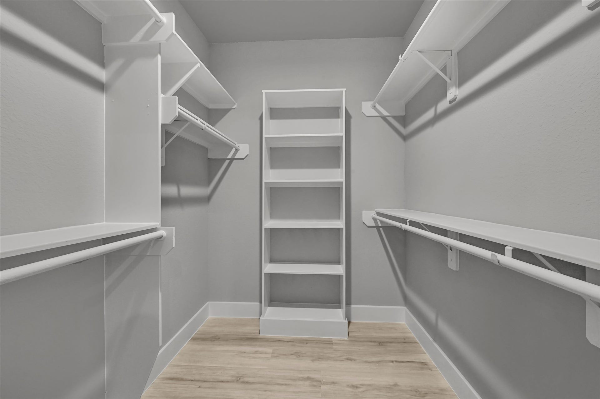 7415 Hezekiah Ln, #B, Houston, TX 77088 Walk in Closet in primary bedroom with custom built ins.