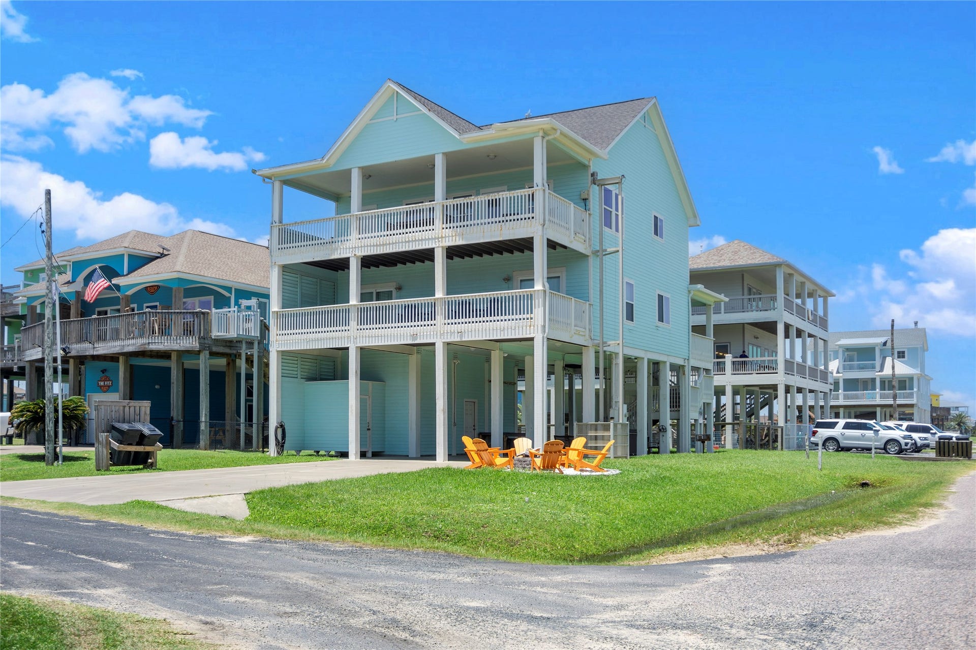 819 Eastview, Crystal Beach, TX 77650 Coastal living feels right at home in this elevated retreat, complete with stacked covered balconies and generous outdoor space.