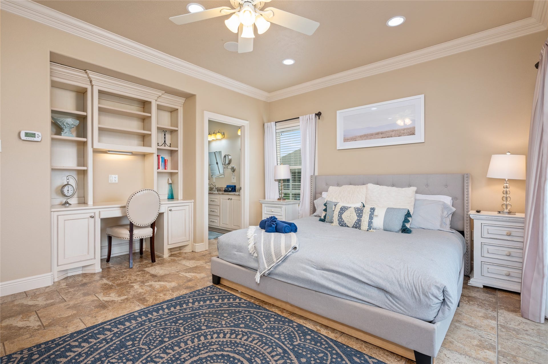 819 Eastview, Crystal Beach, TX 77650 Unwind in your spacious primary bedroom with built-in workspace and storage, private bath access, and plenty of room to settle in comfortably.