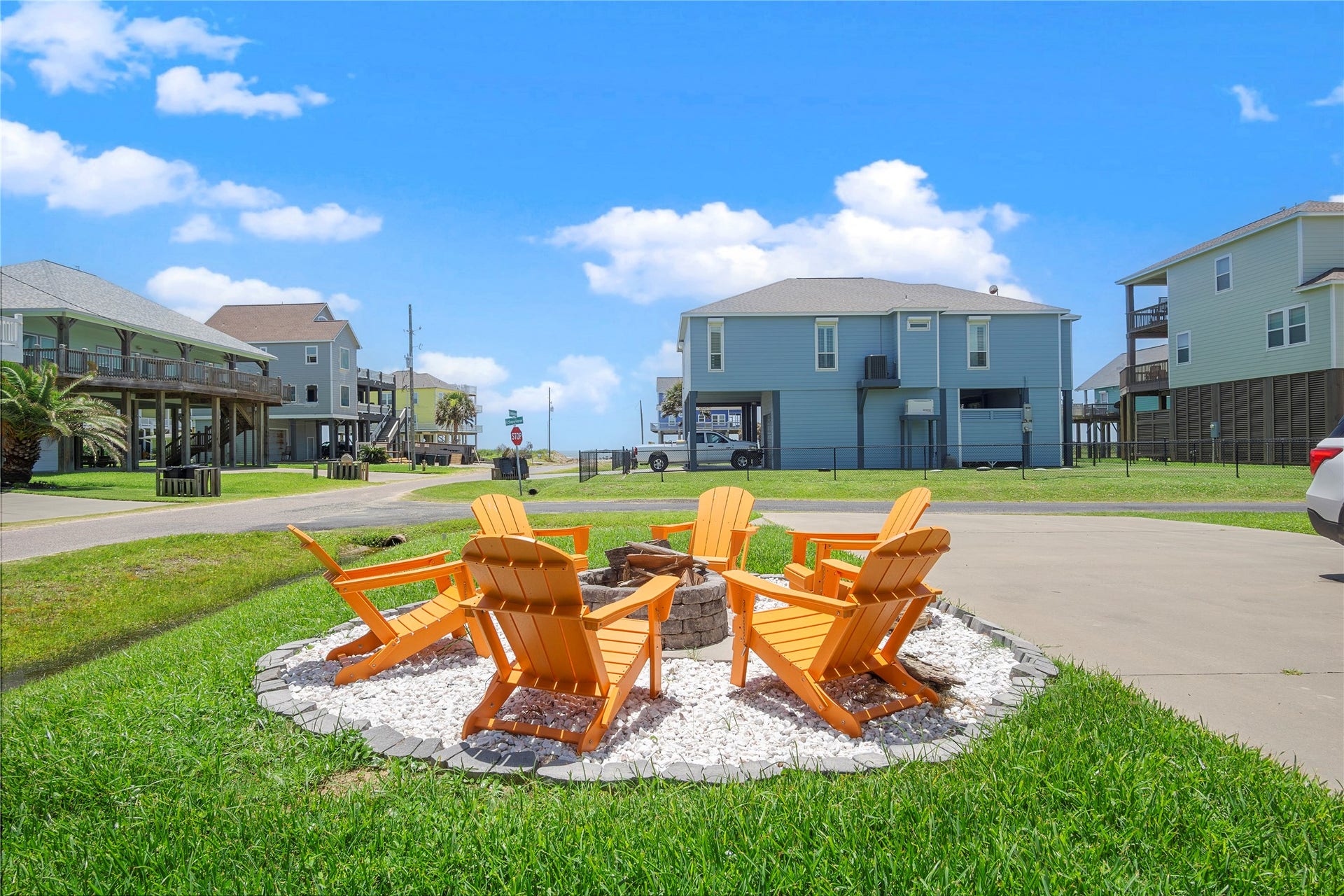 819 Eastview, Crystal Beach, TX 77650 Evenings at home are made for gathering around the firepit, with plenty of Adirondack seating for everyone.
