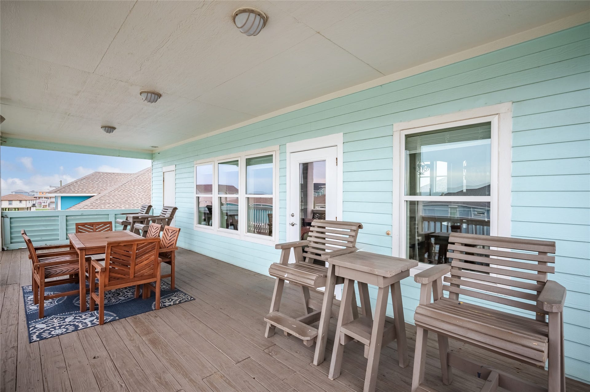 819 Eastview, Crystal Beach, TX 77650 Step right outside from the living area to your expansive covered balcony, already set up for meals and laid-back afternoons outdoors