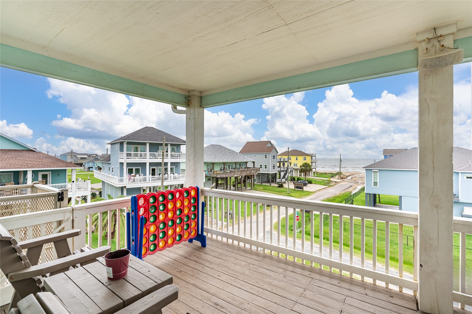 819 Eastview, Crystal Beach, TX 77650 Kick back on the balcony and watch the waves in the distance while the covered setting keeps your outdoor time comfortable and shaded.