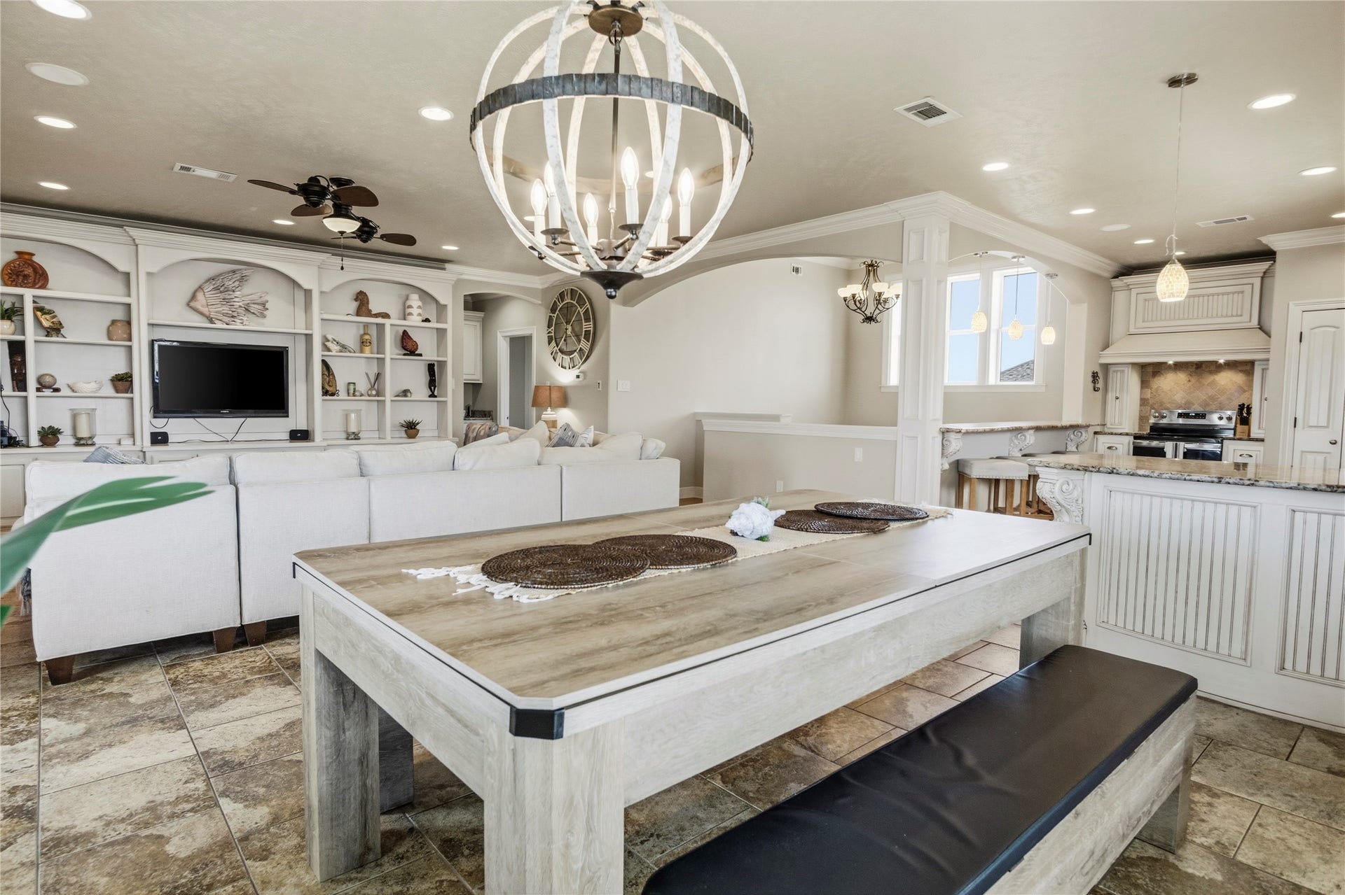 819 Eastview, Crystal Beach, TX 77650 Dinner, game nights, and downtime all come together in this open living space, with the convertible pool table keeping entertainment close at hand.