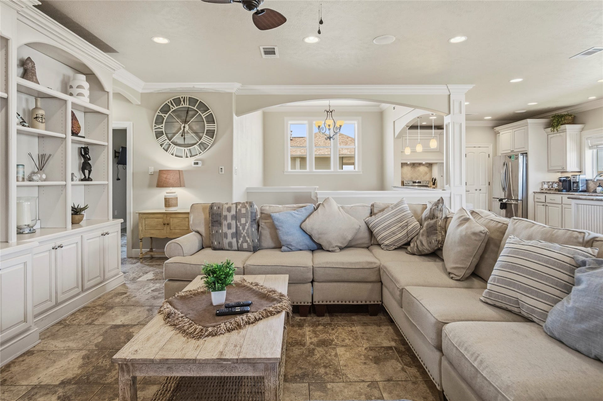 819 Eastview, Crystal Beach, TX 77650 The open living area gives everyone room to settle in, with built-ins and an easy connection to the kitchen and dining spaces.