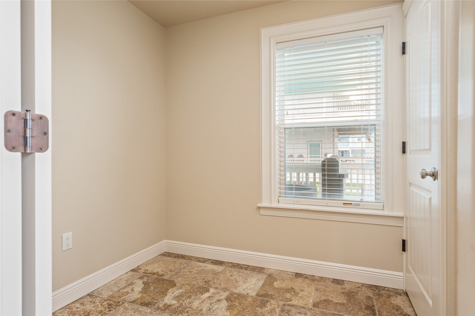 819 Eastview, Crystal Beach, TX 77650 Keep everyday essentials organized in this convenient nook, with built-in cabinetry and a window bringing in natural light.