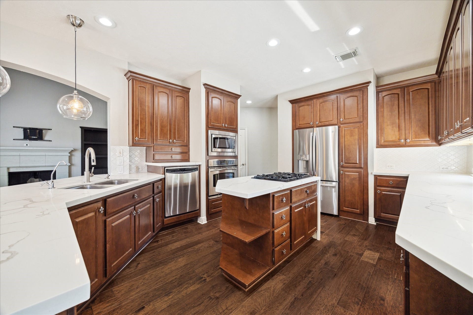 12006 Arcadia Bend Lane, Houston, TX 77041 Updated kitchen w top of the line stainless appliances, Quartz counters & tile backsplash