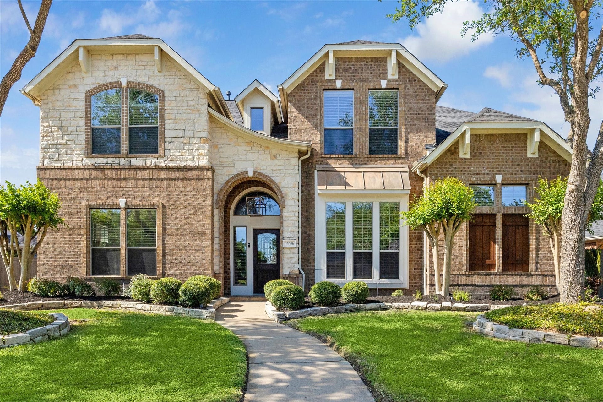 12006 Arcadia Bend Lane, Houston, TX 77041 Custom stone & brick elevation by Trendmaker Builders