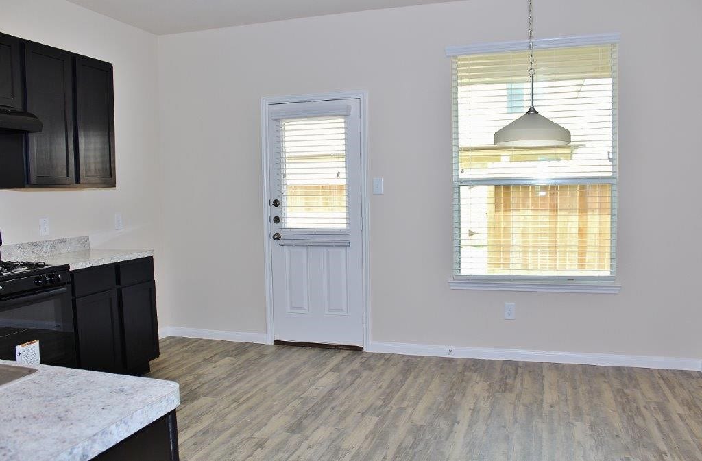 12315 Roy Mix Bohn Lane, Houston, TX 77044 Photos may be representative of the floor plan and not the exact home. Finishes, layout, and features of the actual property for lease may vary.