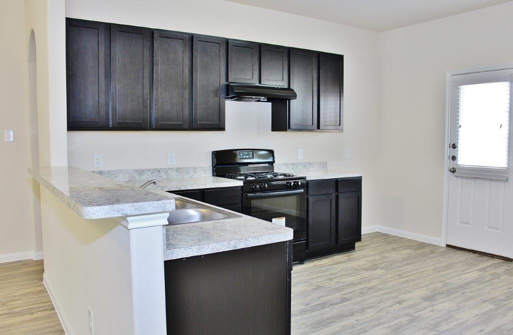 12315 Roy Mix Bohn Lane, Houston, TX 77044 Photos may be representative of the floor plan and not the exact home. Finishes, layout, and features of the actual property for lease may vary.