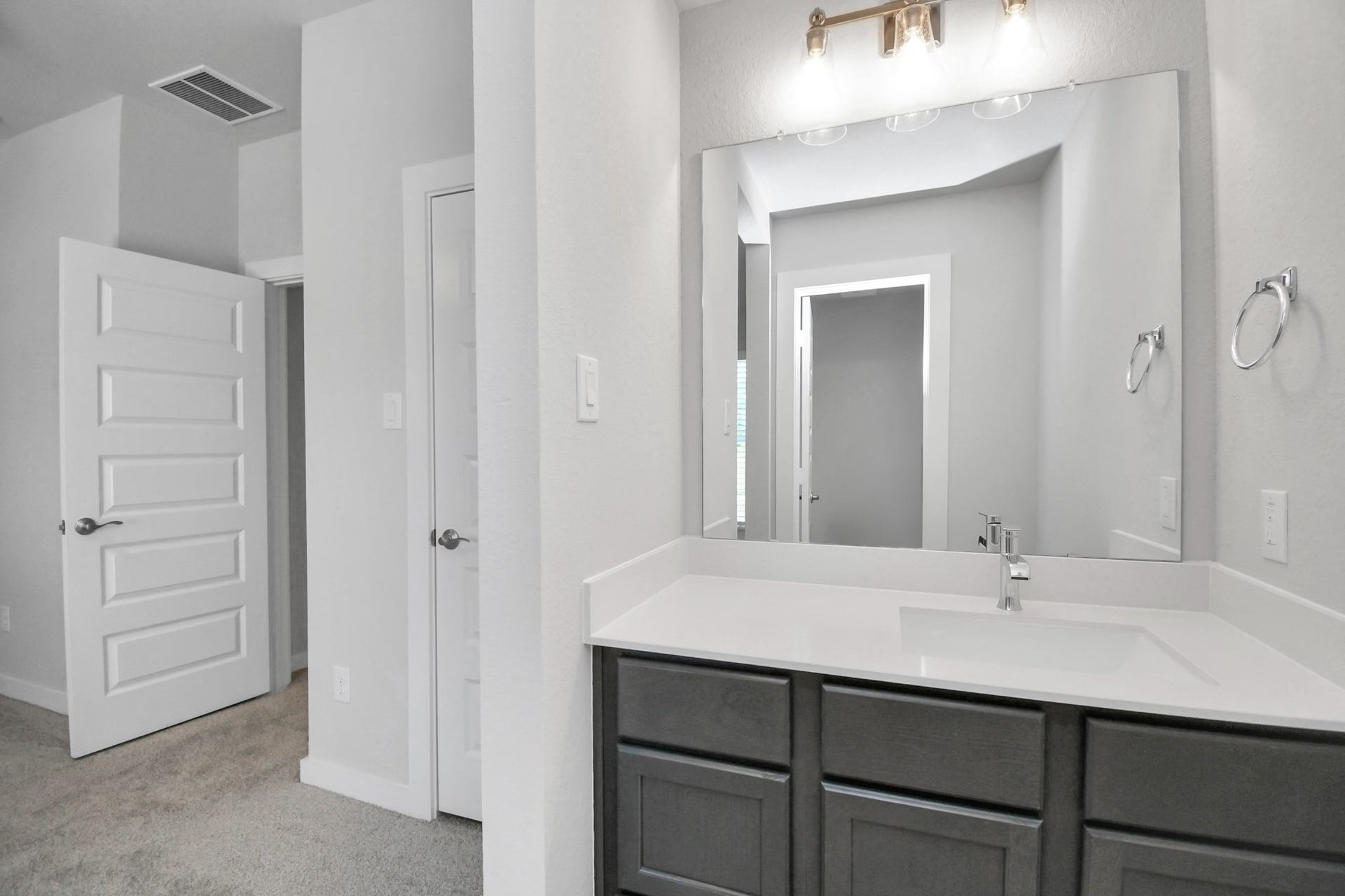 3114 Native Spring Drive, Spring, TX 77373 Secondary bath features tile flooring, bath/shower combo with tile surround, light stained wood cabinets, beautiful light countertop. Sample photo of completed home with similar floor plan. Actual colors and selections may vary.