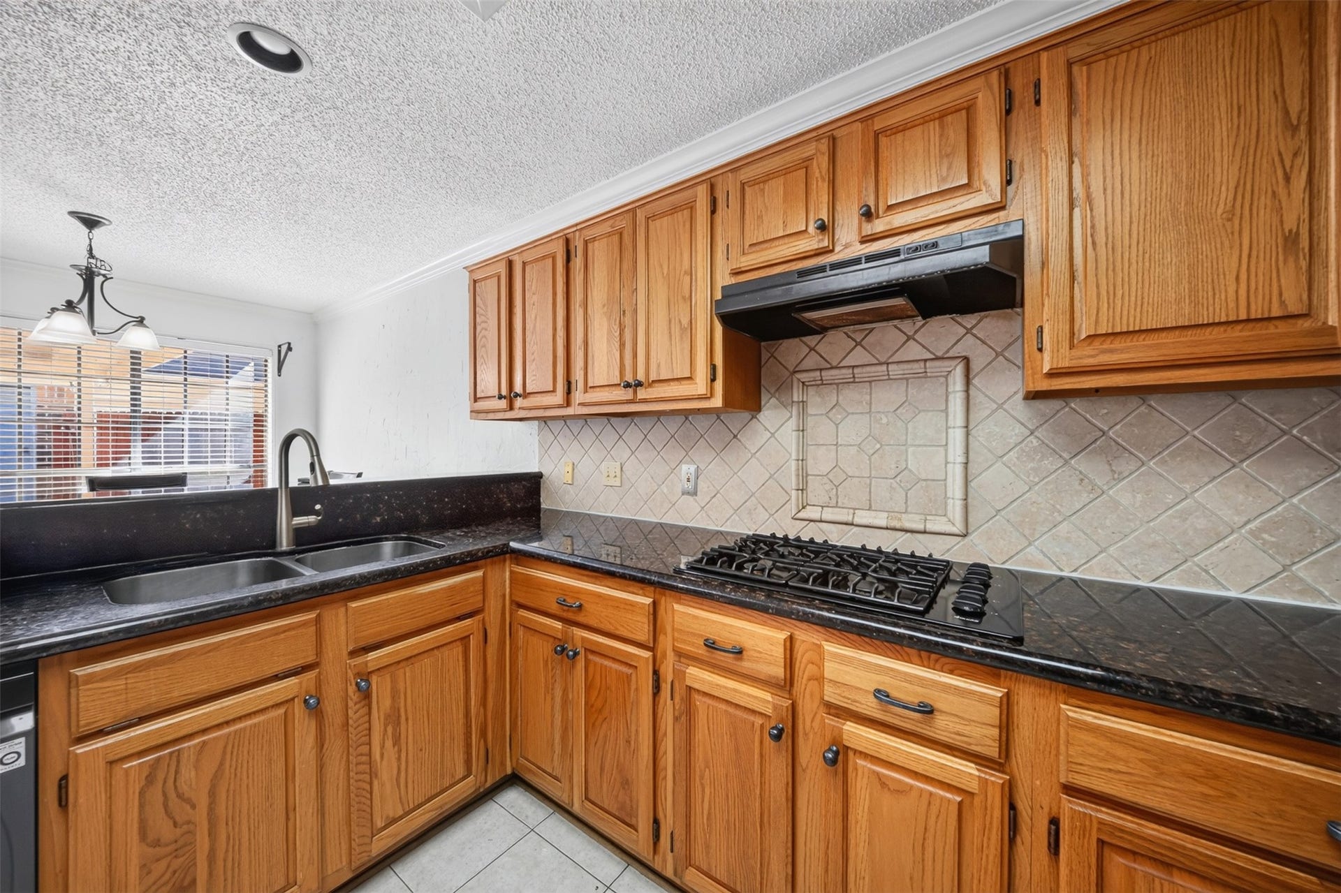 10215 Minturn Lane, Houston, TX 77064 Kitchen offering abundant cabinetry, generous counter space, and a functional layout.