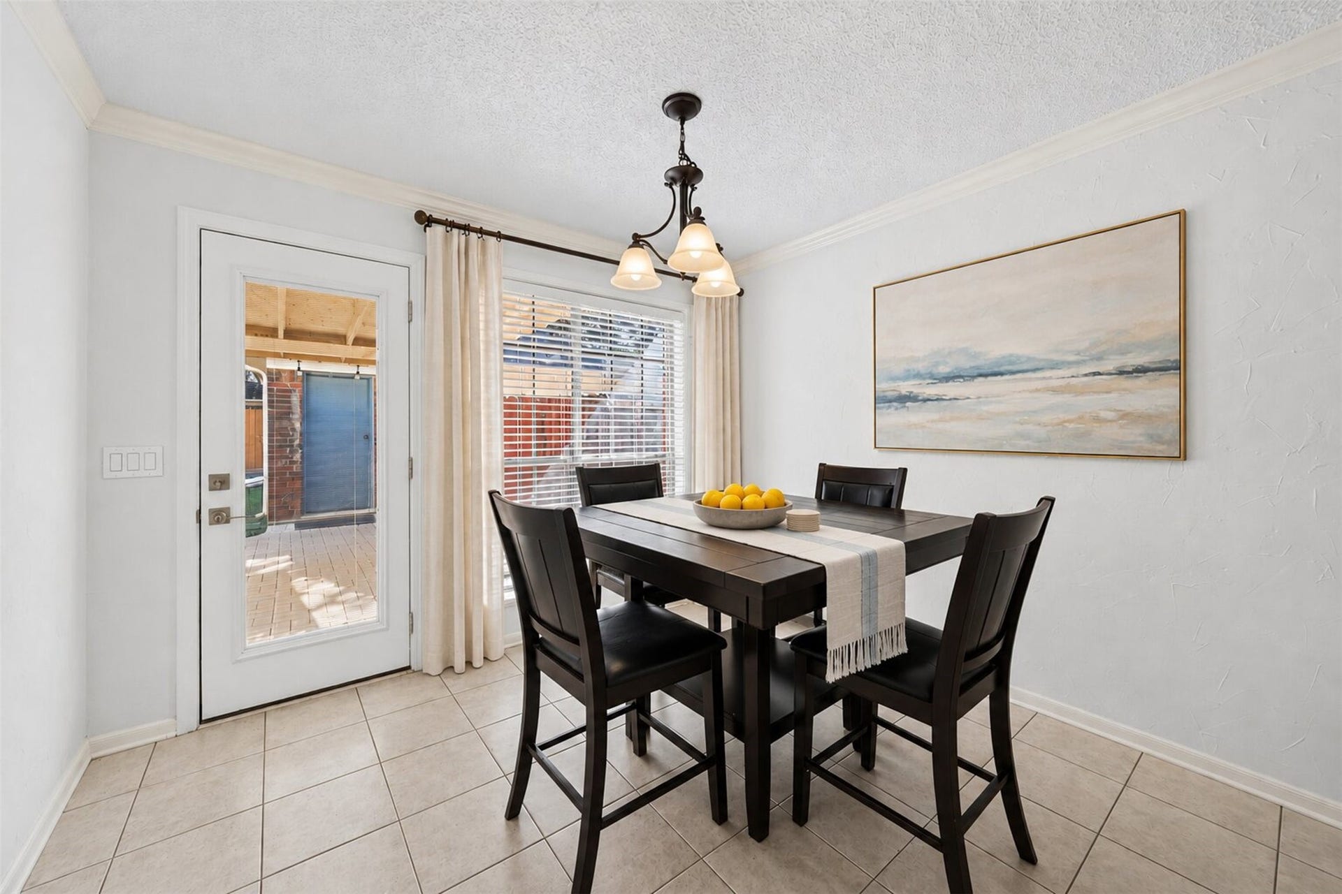10215 Minturn Lane, Houston, TX 77064 Virtually staged dining area showcasing a comfortable setting for meals and gatherings.